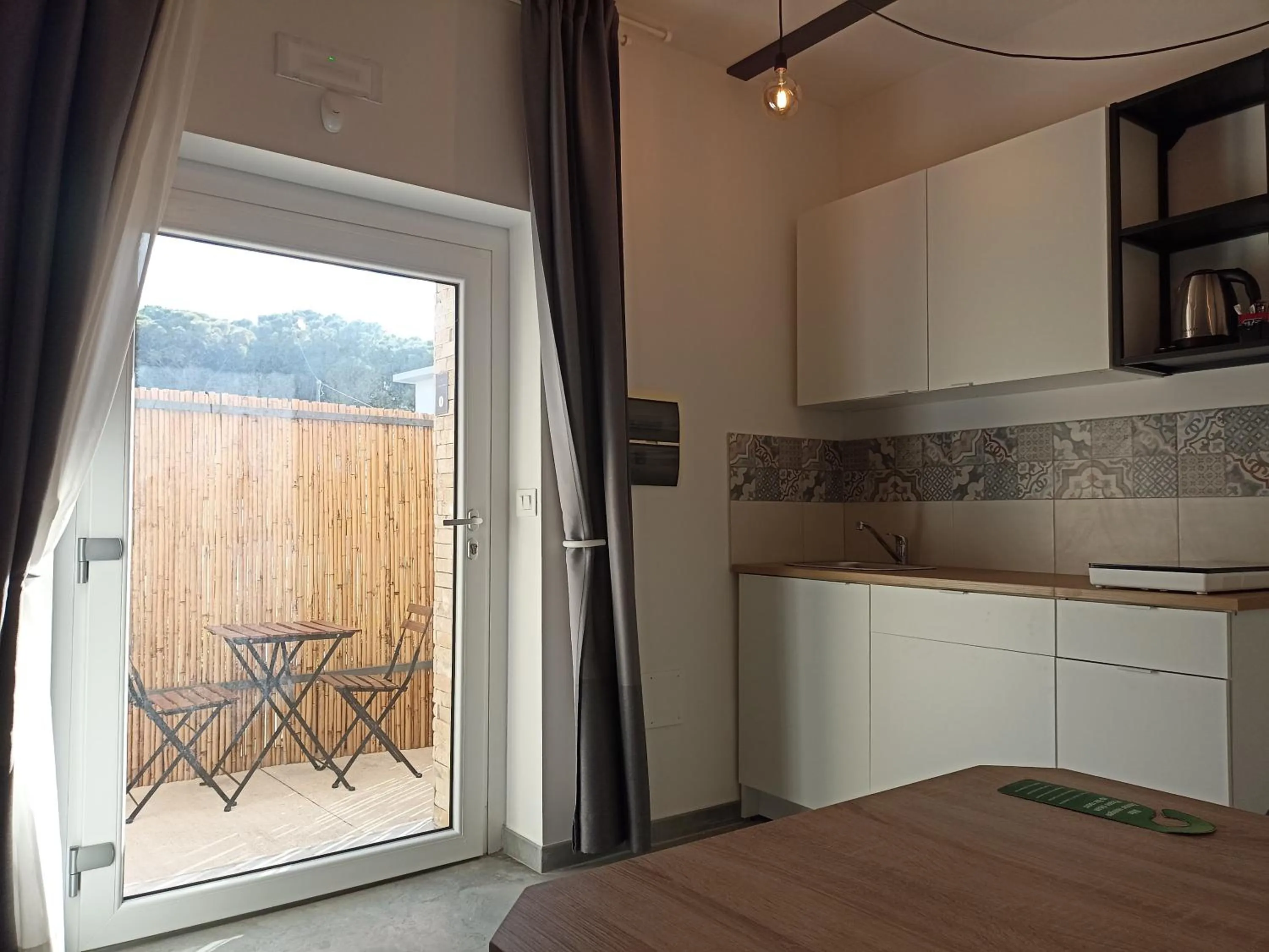 Kitchen or kitchenette in Al Faro Bianco B&B e Residence con parcheggio