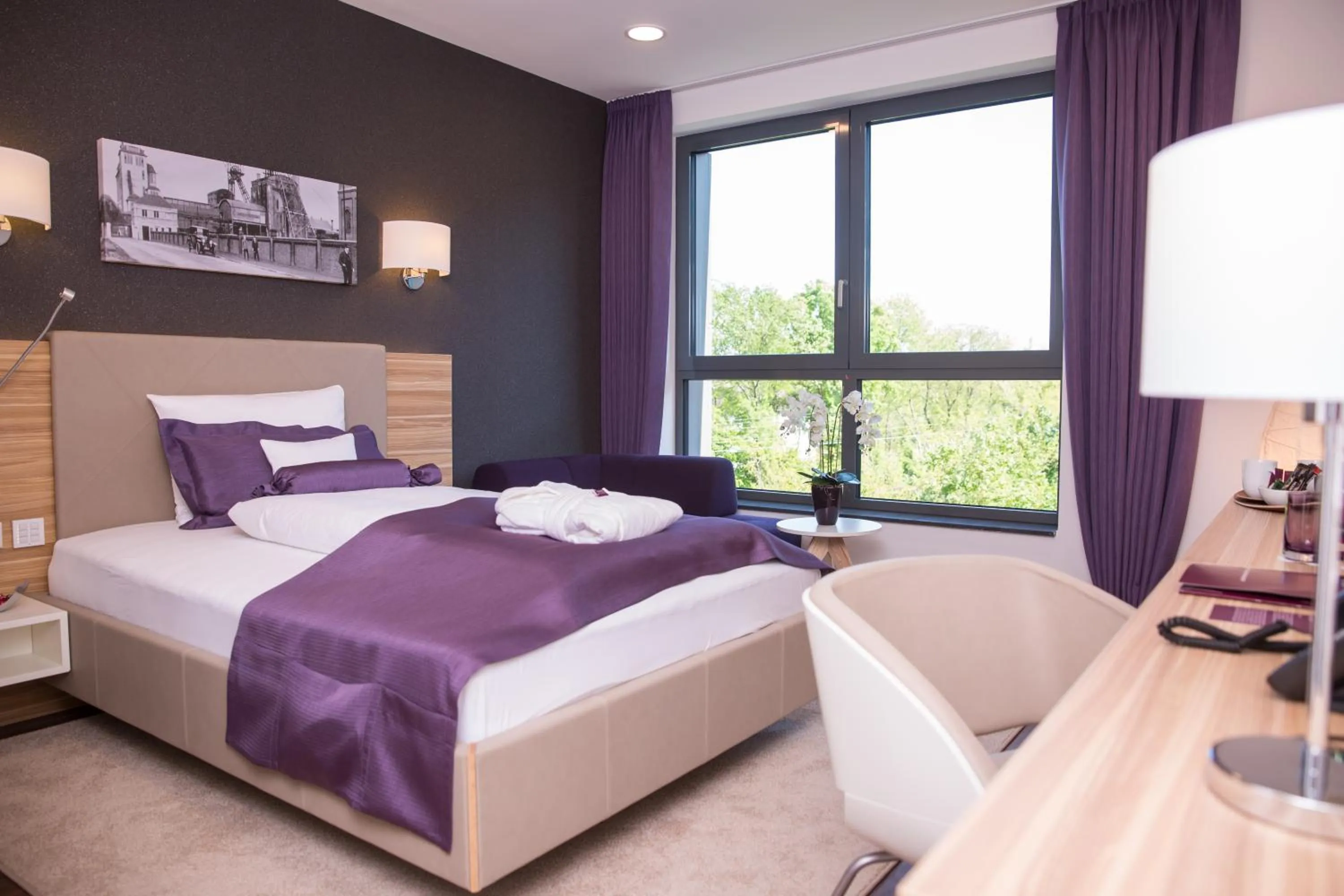 Bed in Heiner's Parkhotel