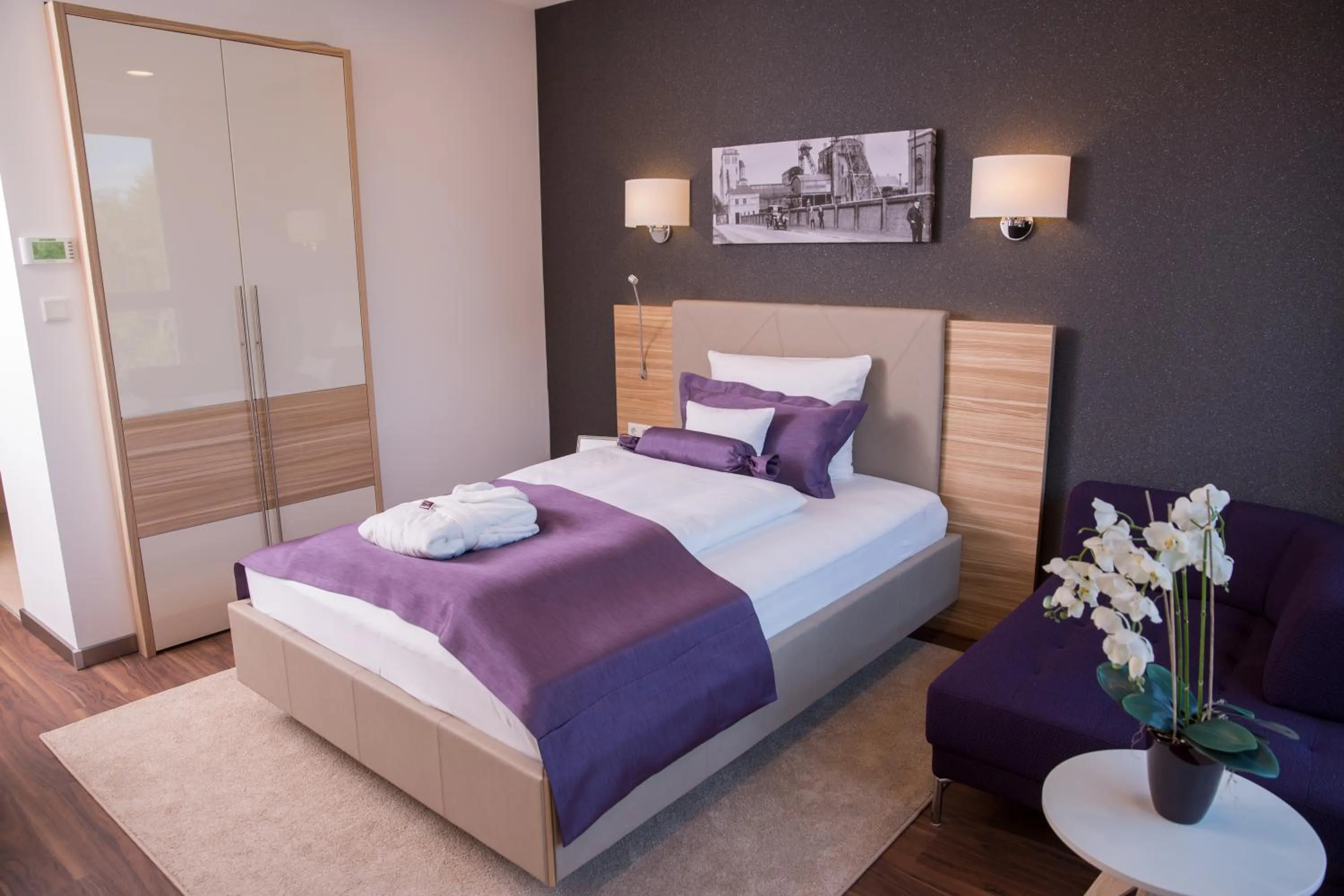 Bed in Heiner's Parkhotel