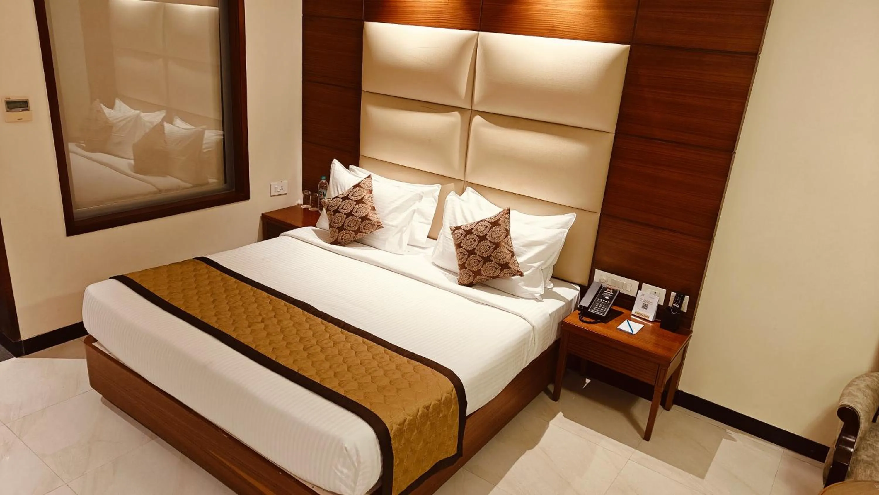 Bed in MM Legacy - A Bergamont Hotel, Kanchipuram