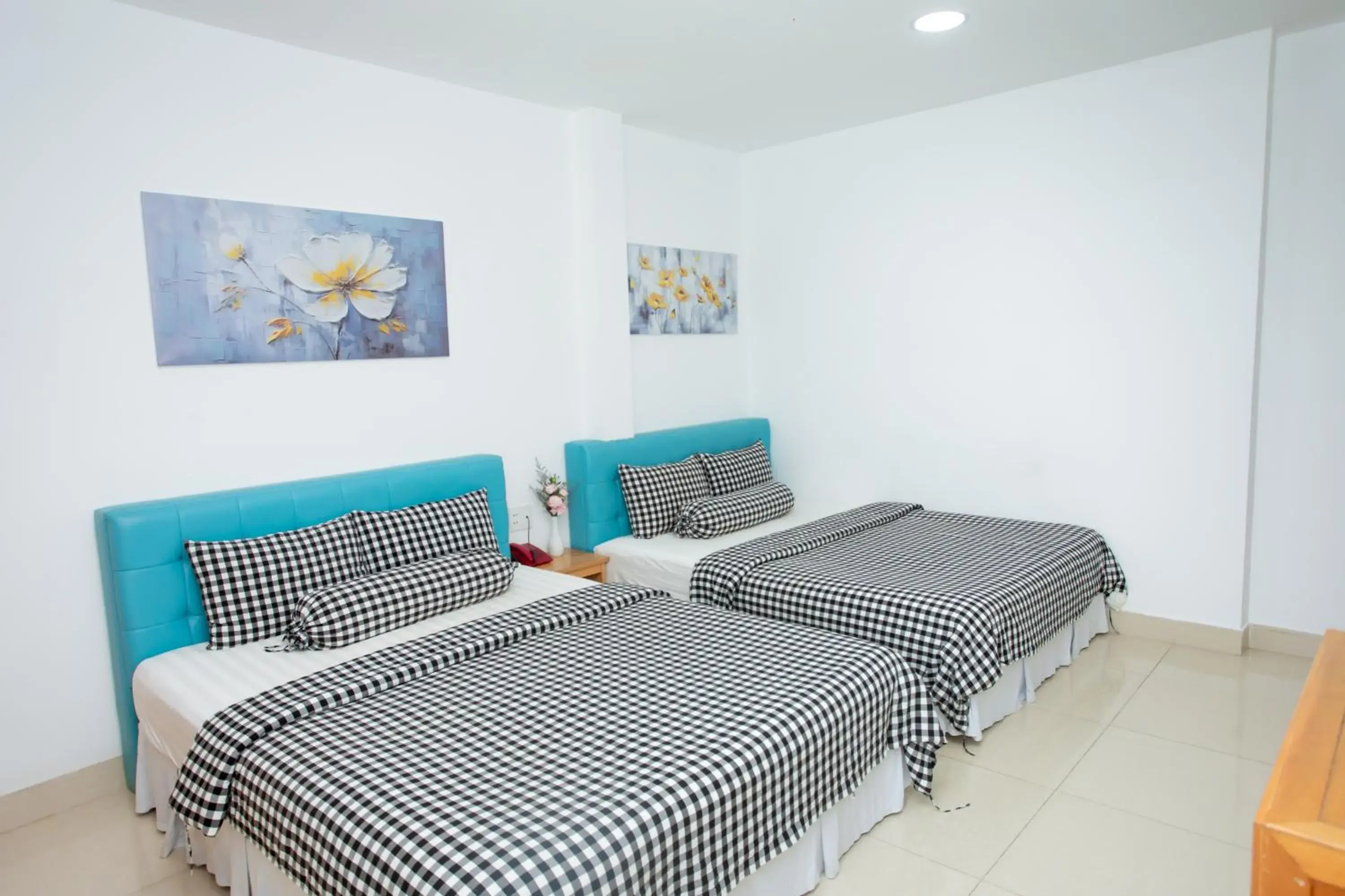 Deluxe Quadruple Room in Phan Anh Hotel - Bui Vien Walking Street Deluxe Quadruple Room in Phan Anh Hotel - Bui Vien Walking Street