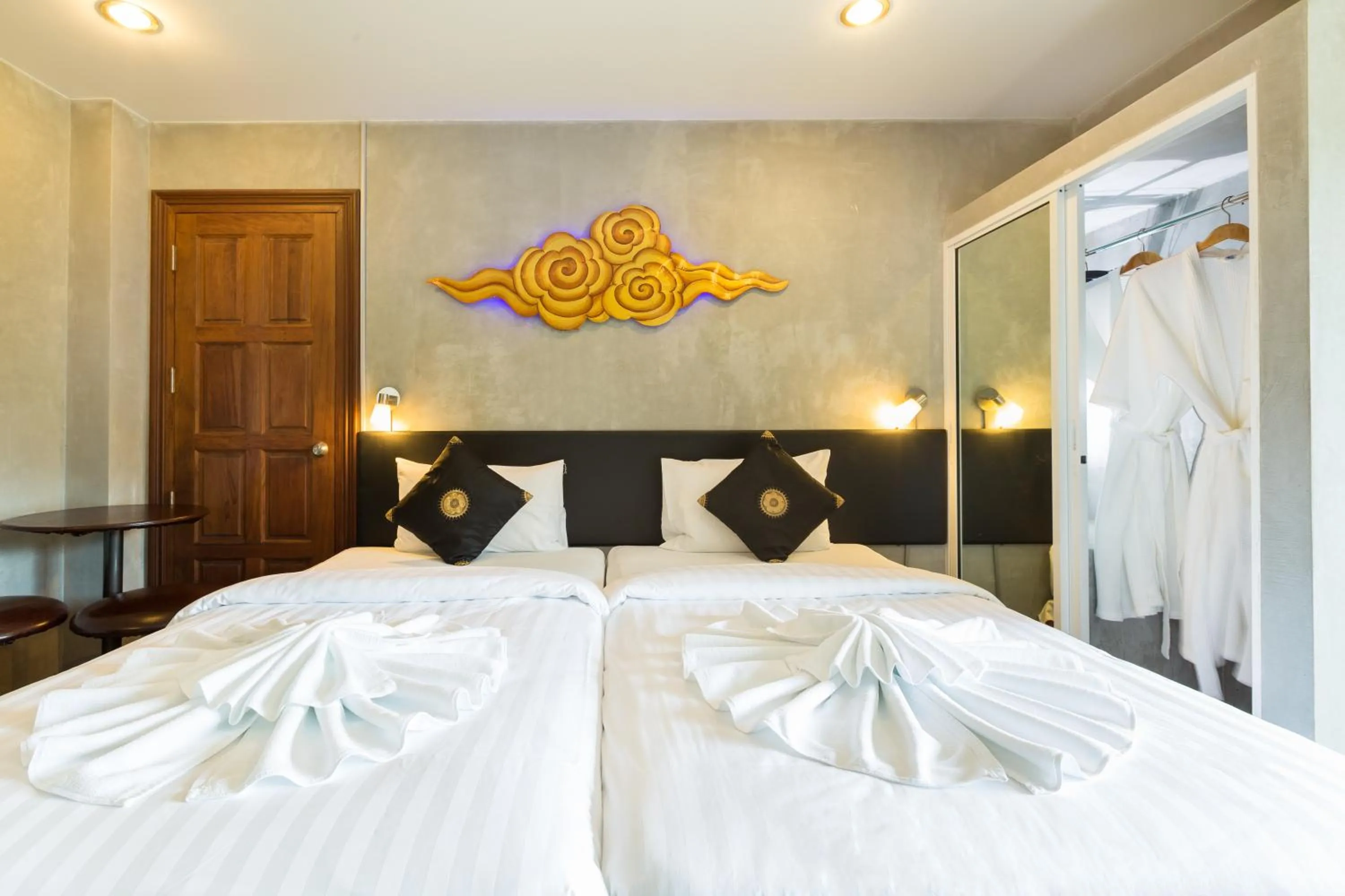 Bed in Baan Kamala Fantasea Hotel