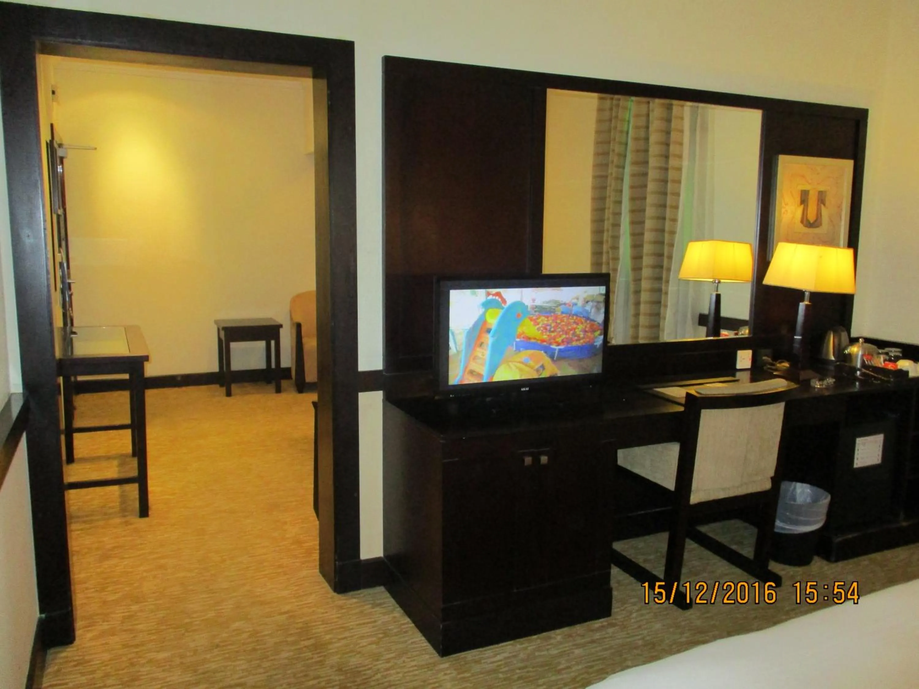 TV and multimedia, TV/Entertainment Center in Issham Hotel