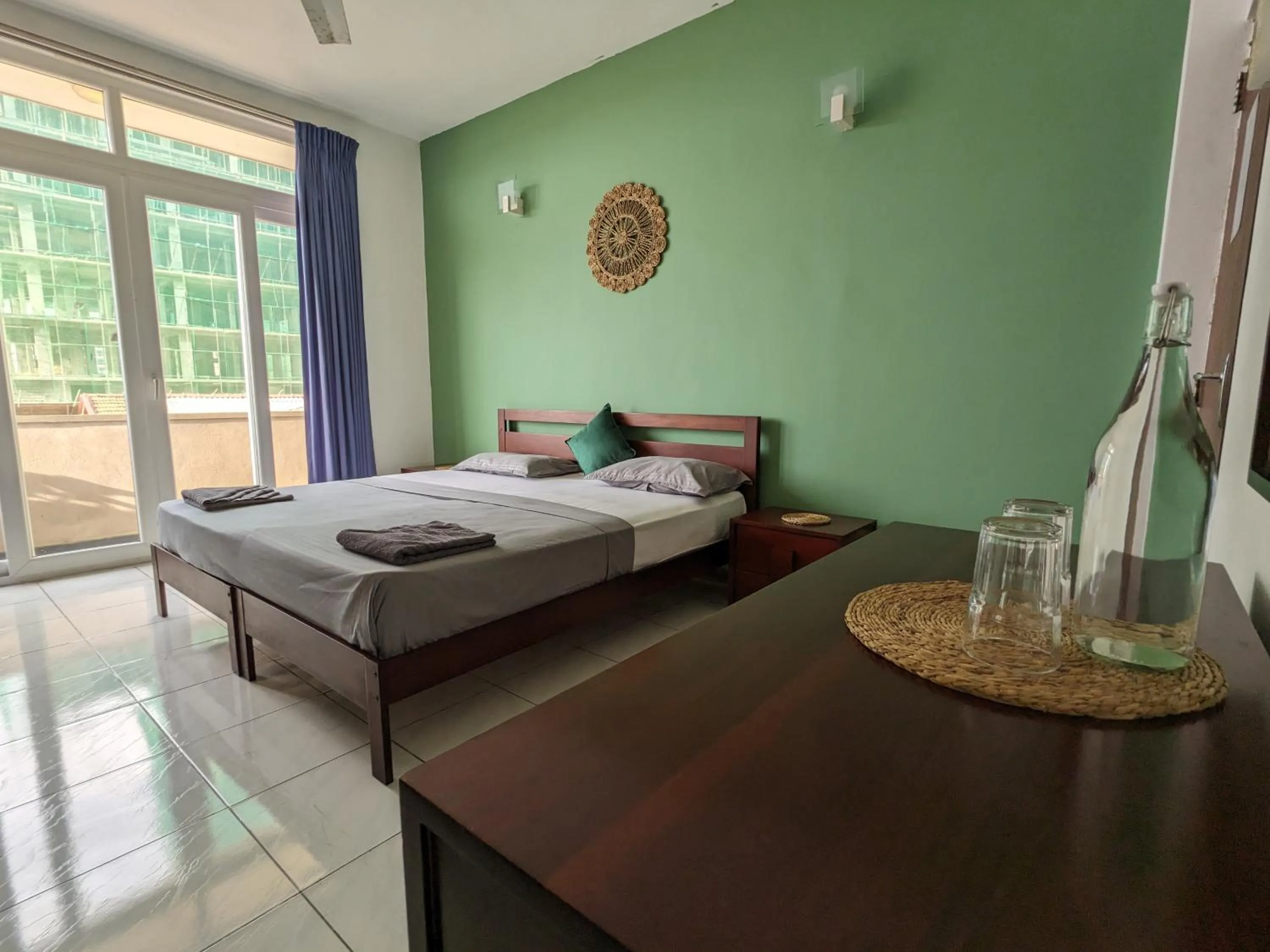 Bed in Palmyrah Residencies