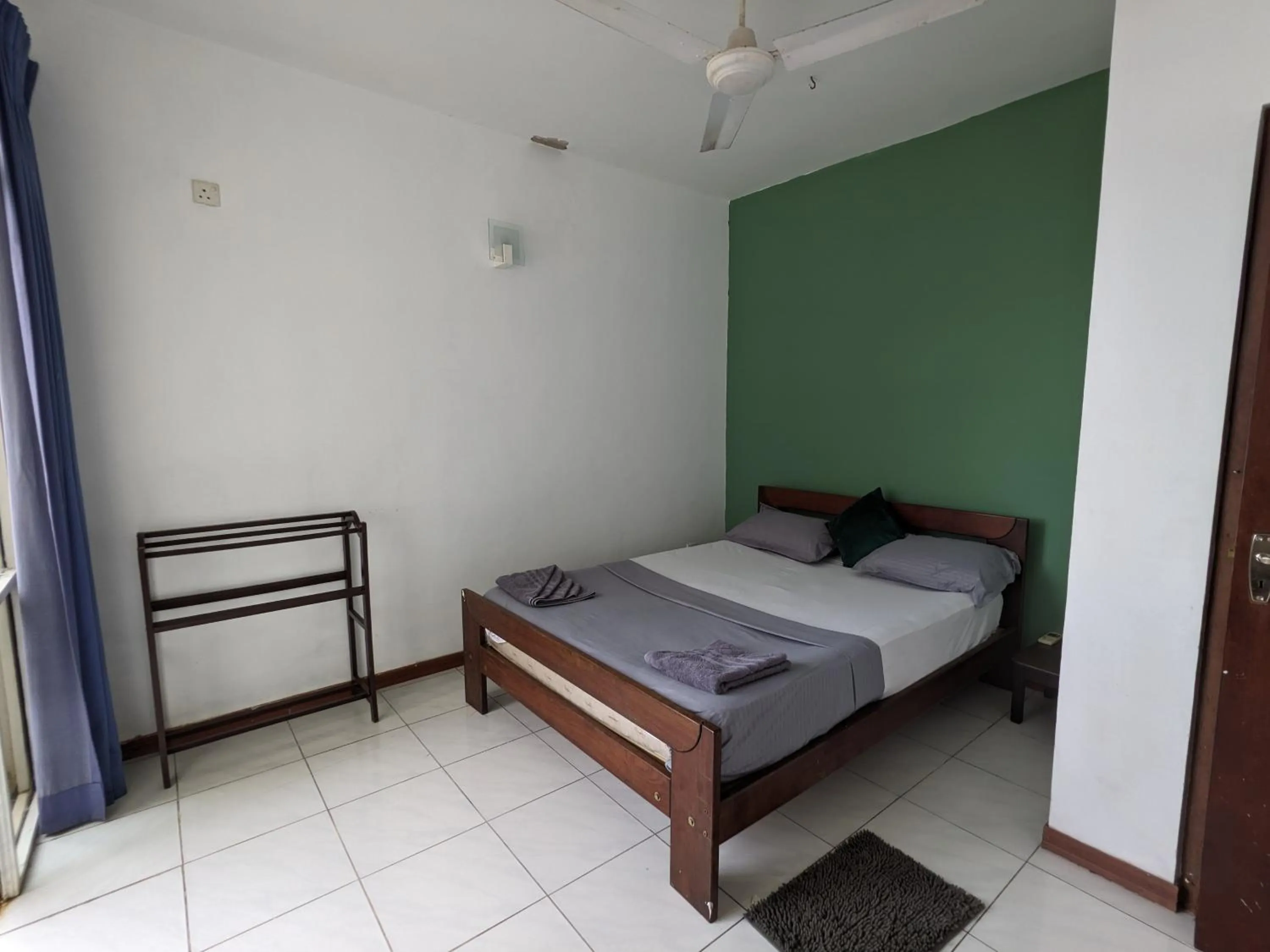 Bed in Palmyrah Residencies