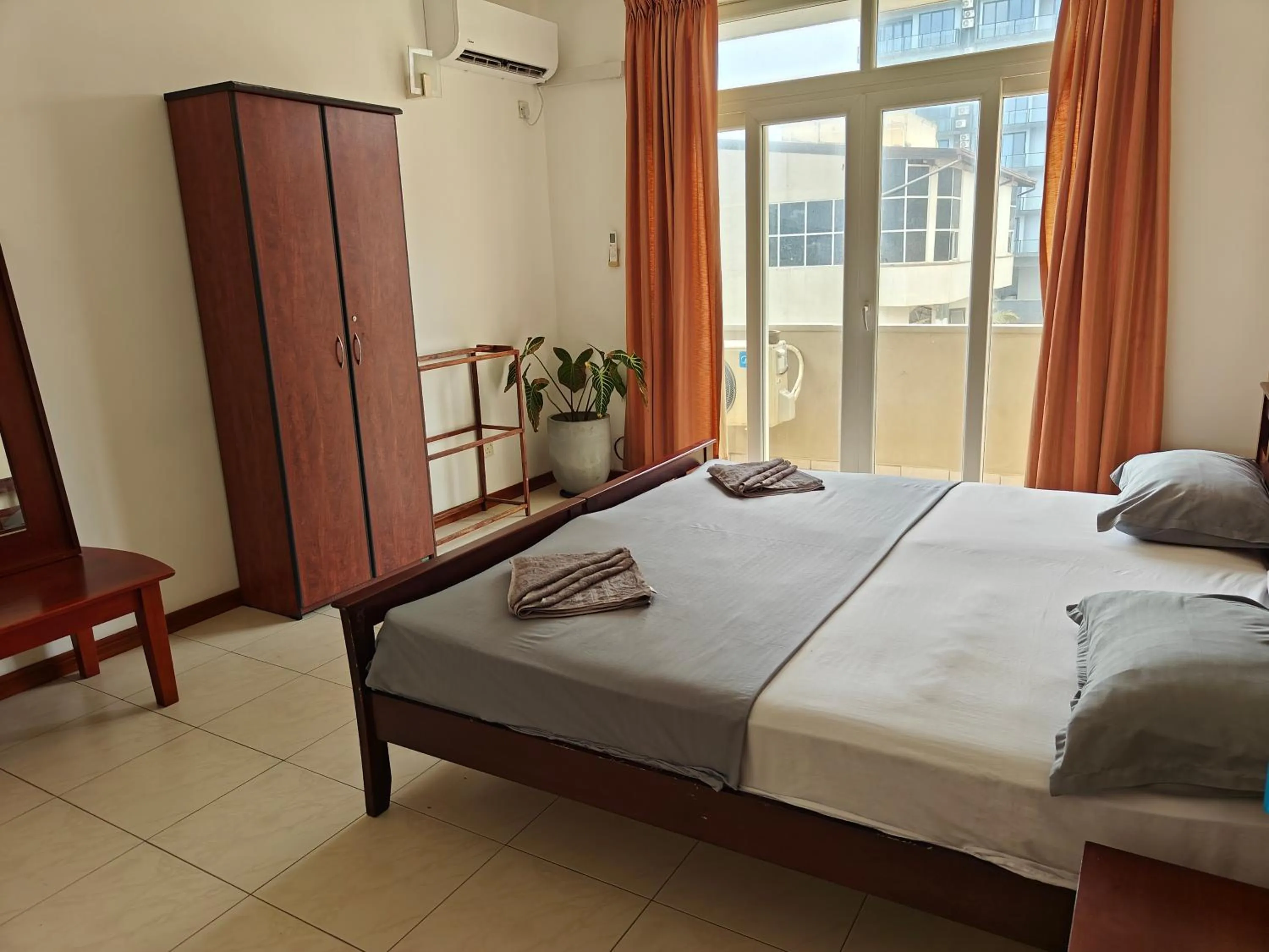 Bed in Palmyrah Residencies