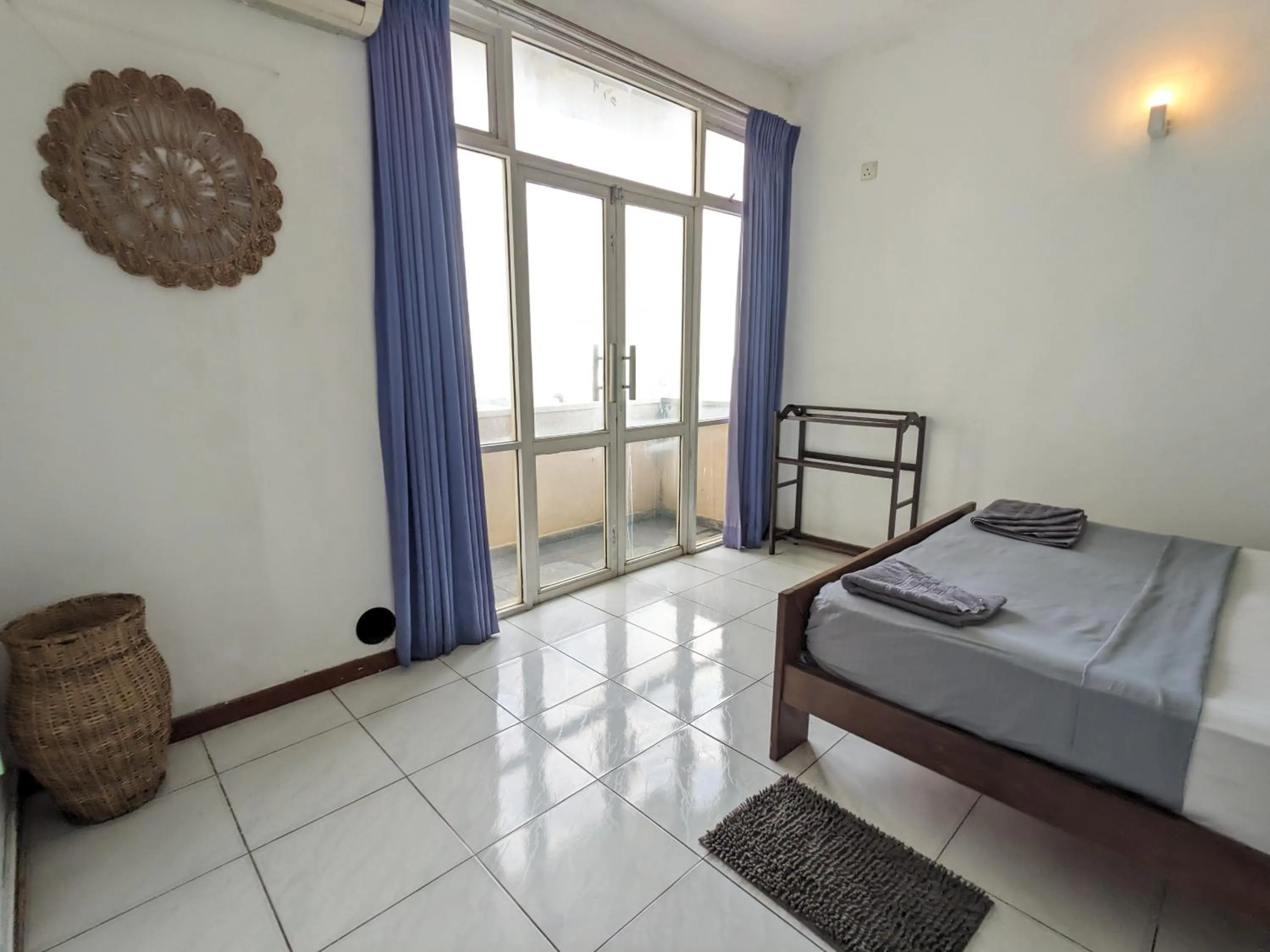 Bed in Palmyrah Residencies