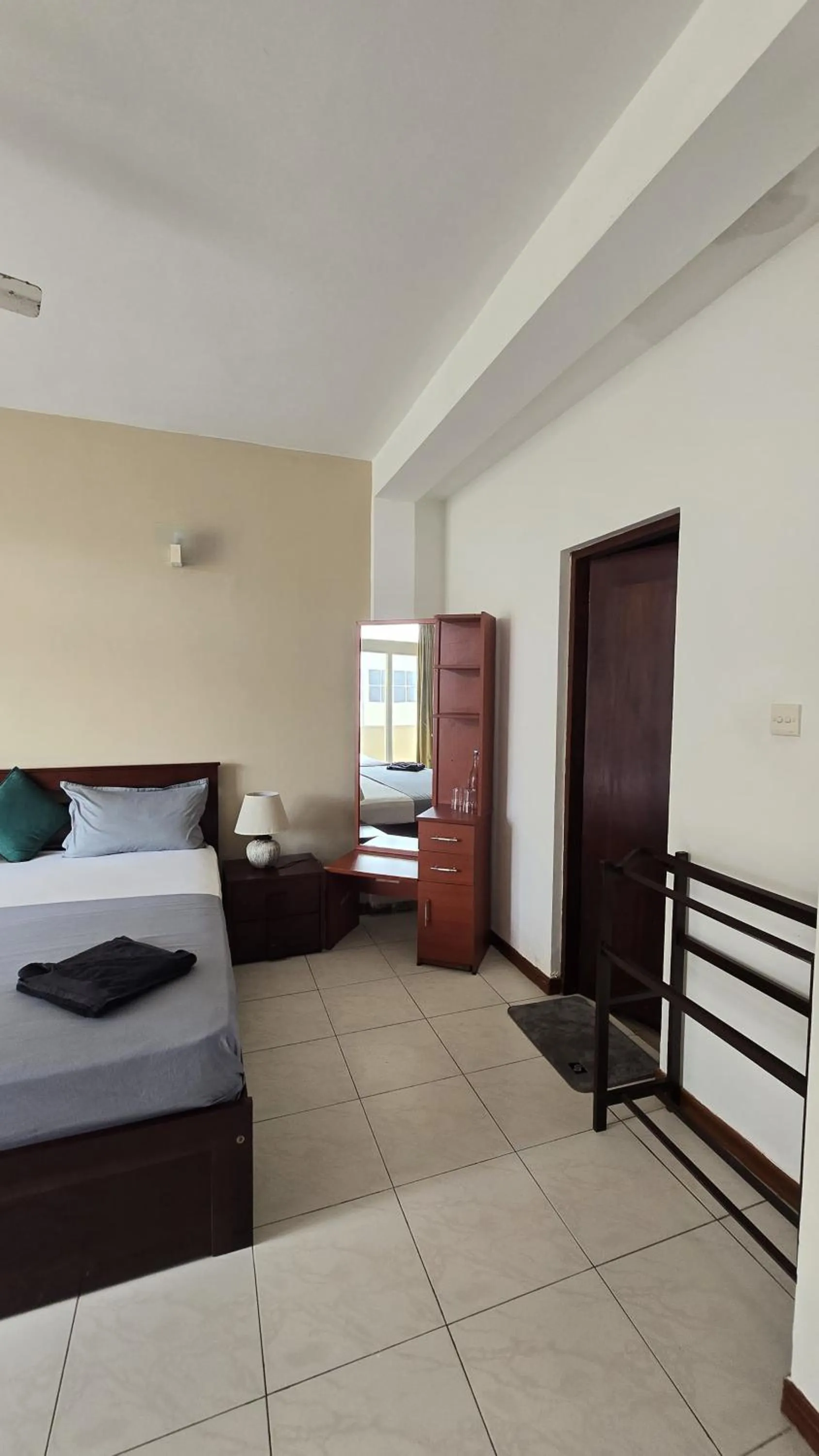 Bed in Palmyrah Residencies