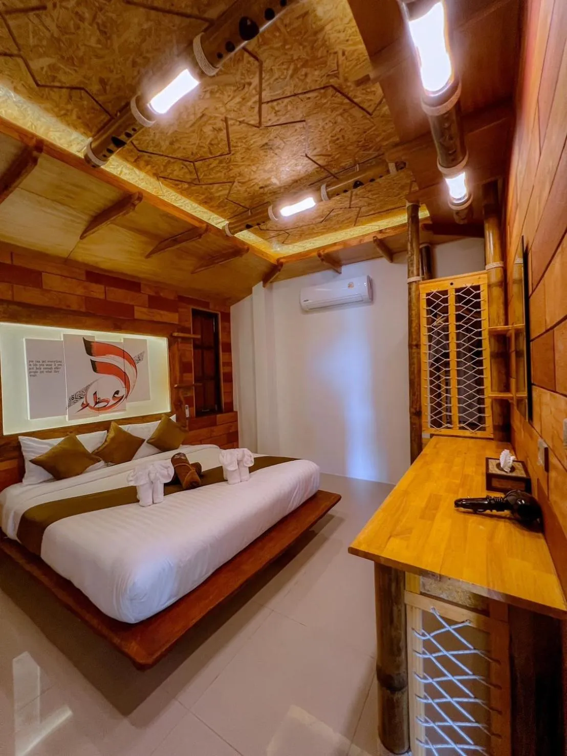 Bed in Puteri Lanta Family Villas