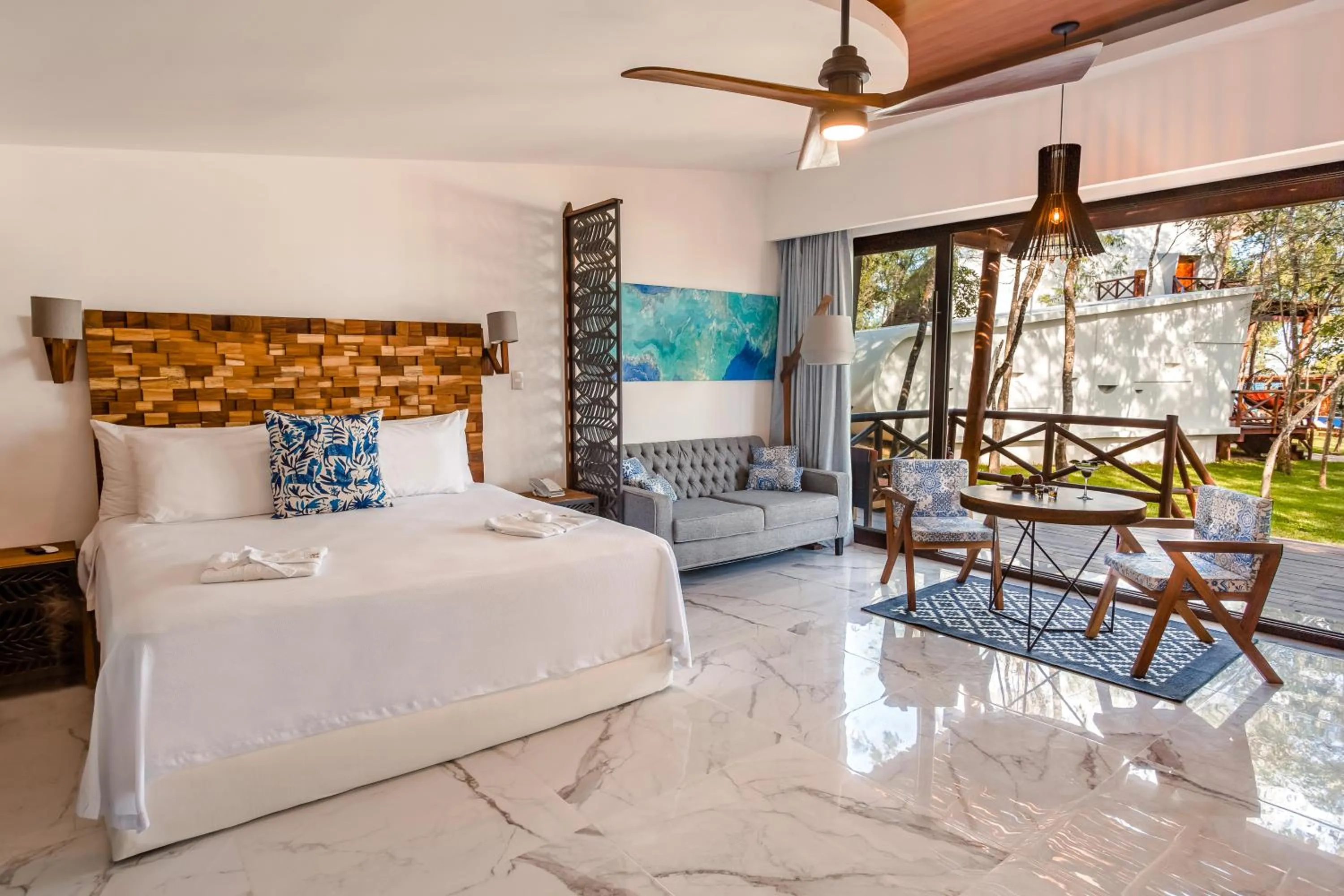 Bed in Mia Bacalar Luxury Resort & Spa