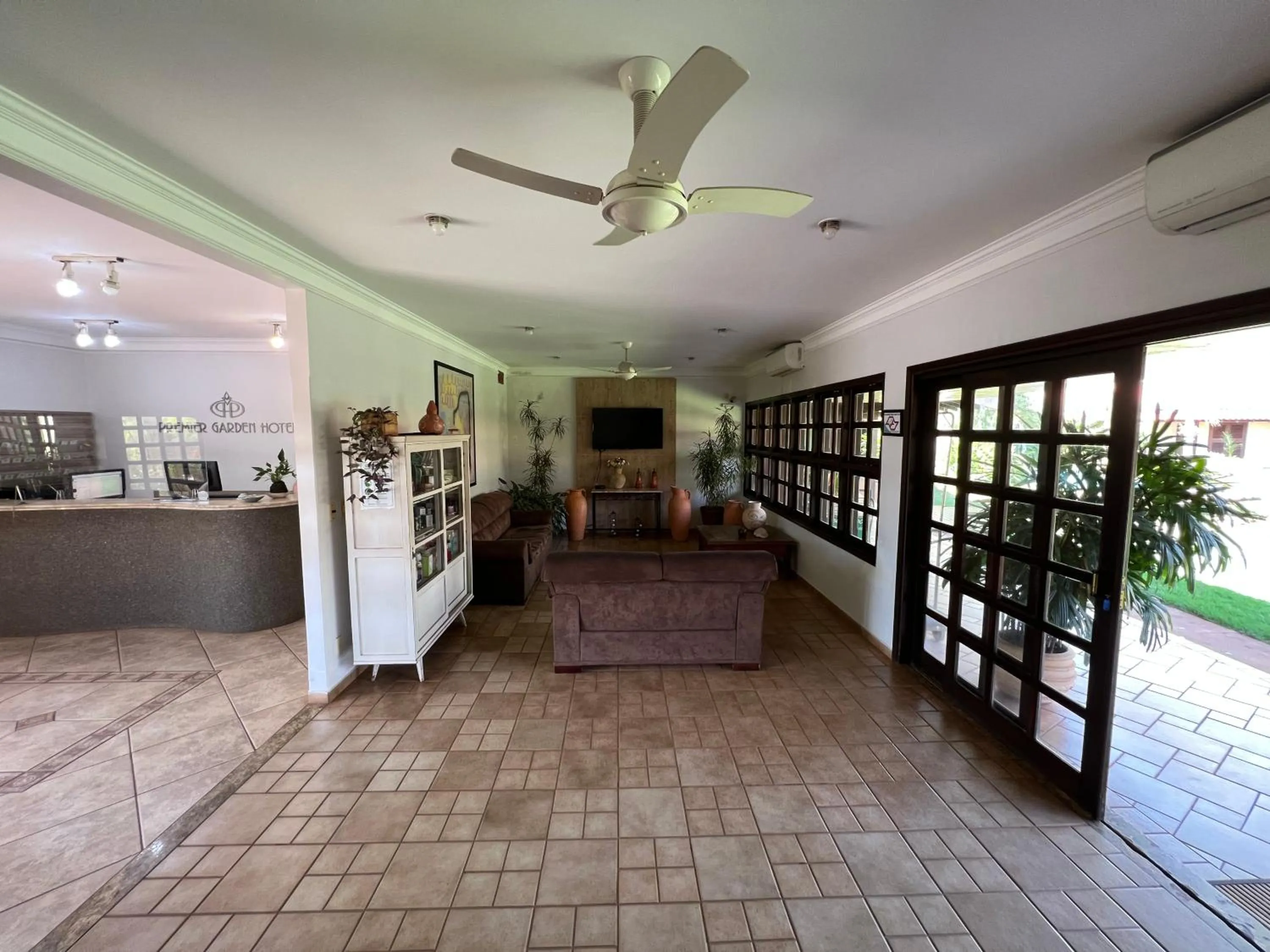 Communal lounge/ TV room in Premier Garden Hotel