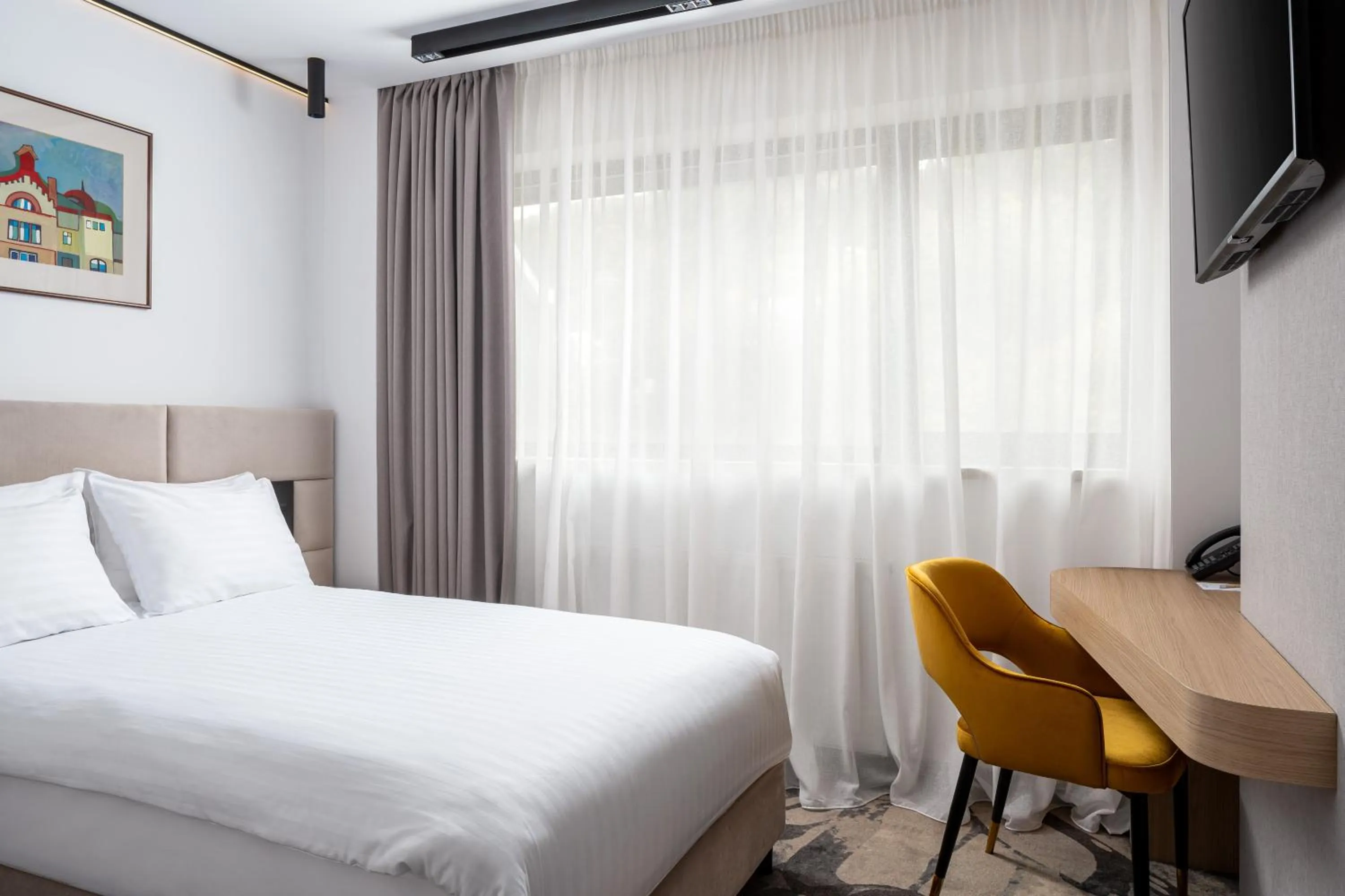 Bed in Hotel Alexandrion Experience