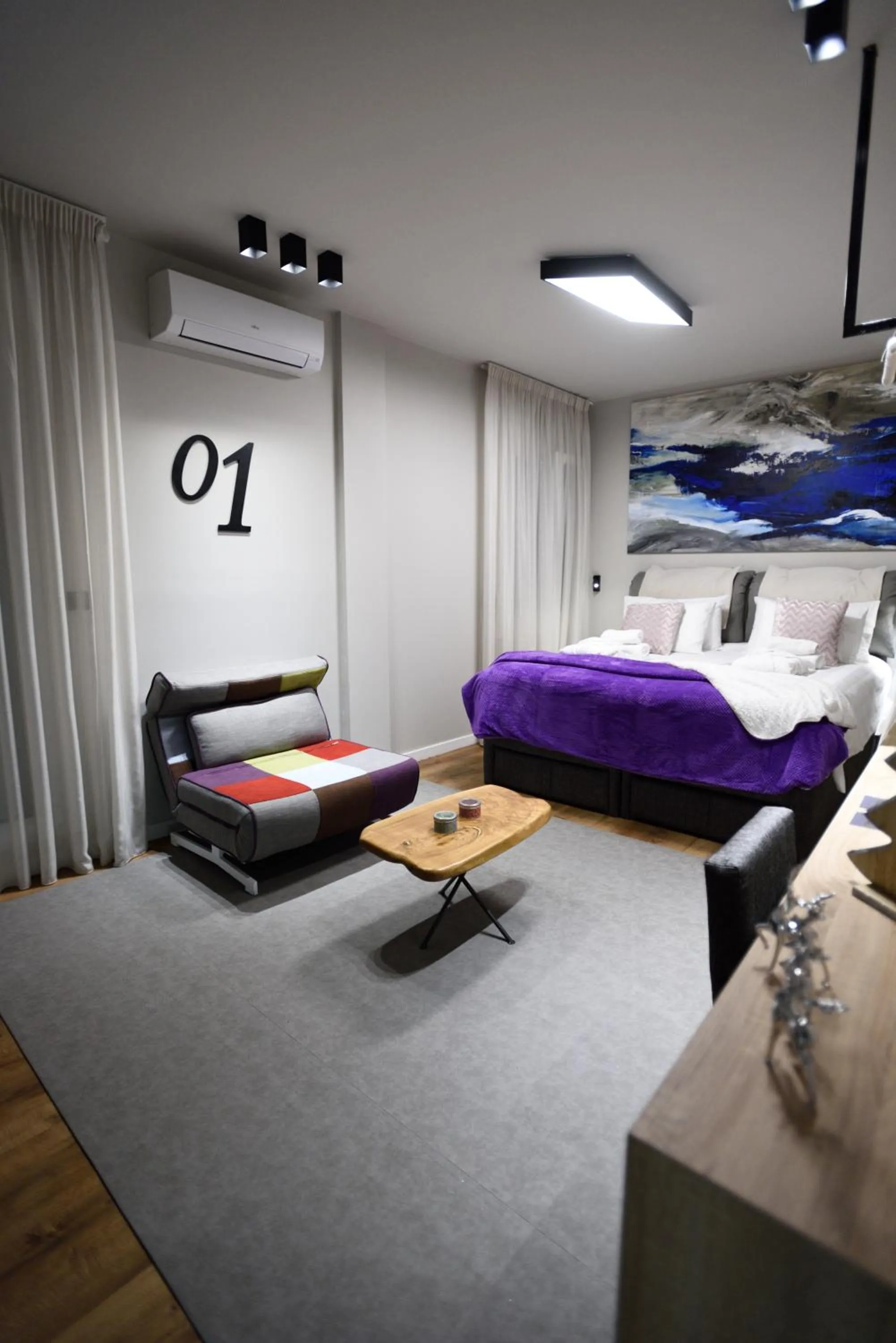 Bed in Magnifique Luxury Suites