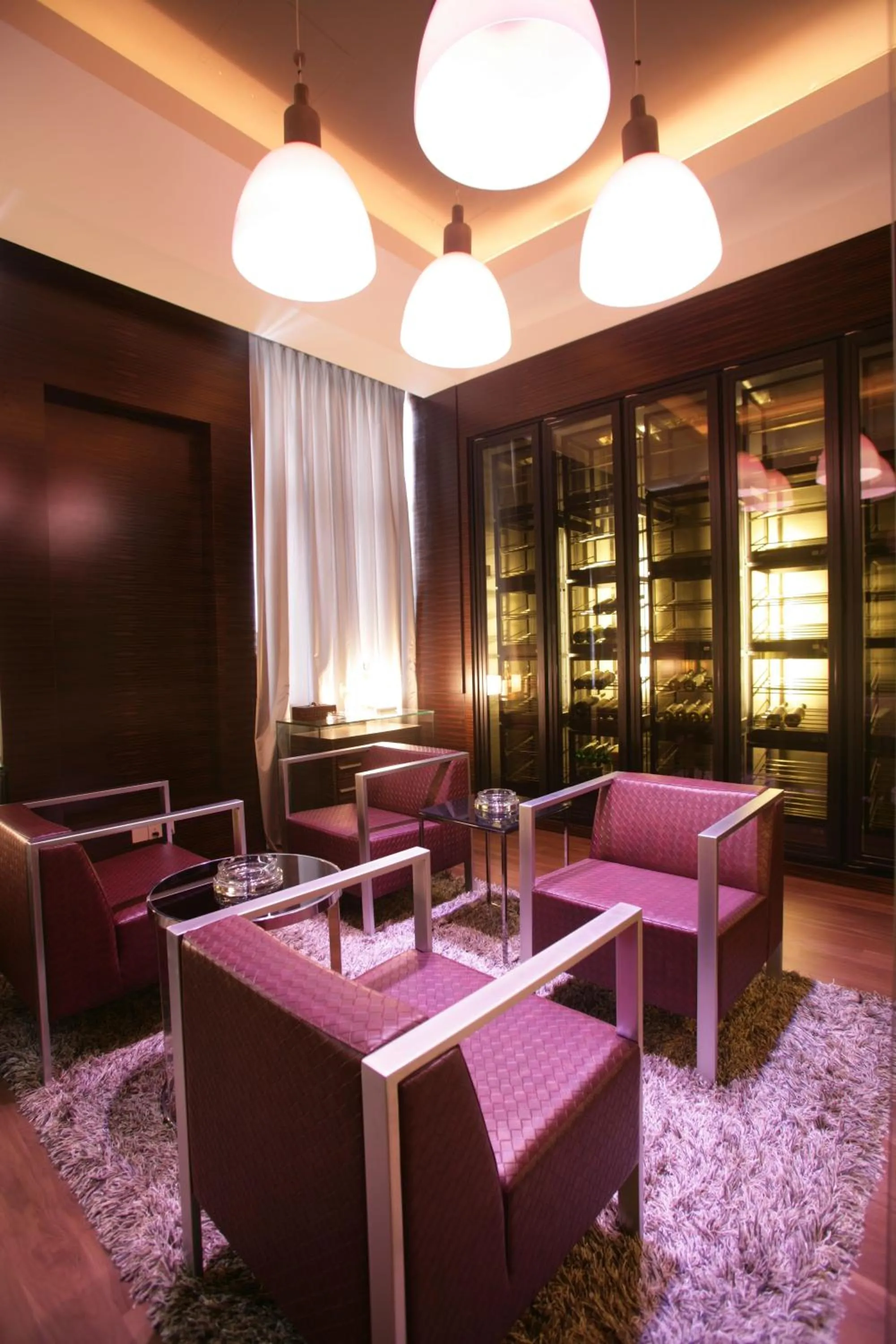 Seating area in Orchard Scotts Residences by Far East Hospitality