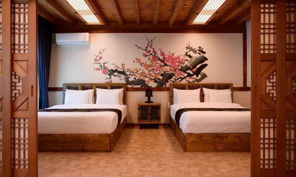 Bed in Jeonju Wangyijimil Hanok Hotel