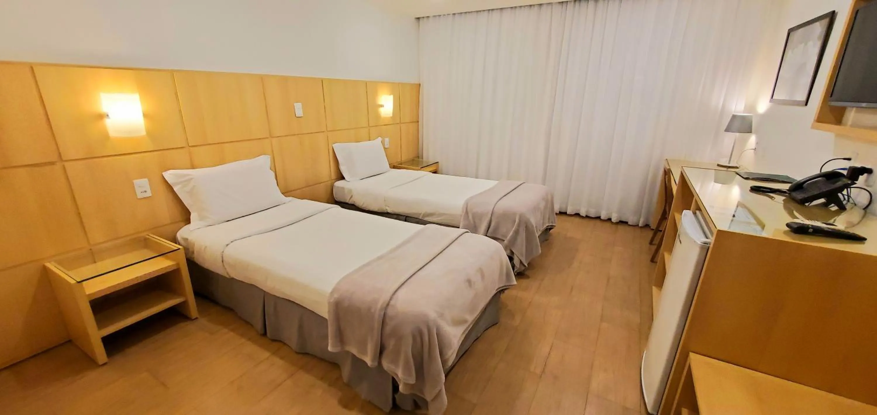 Bed in Atlantico Sul Hotel