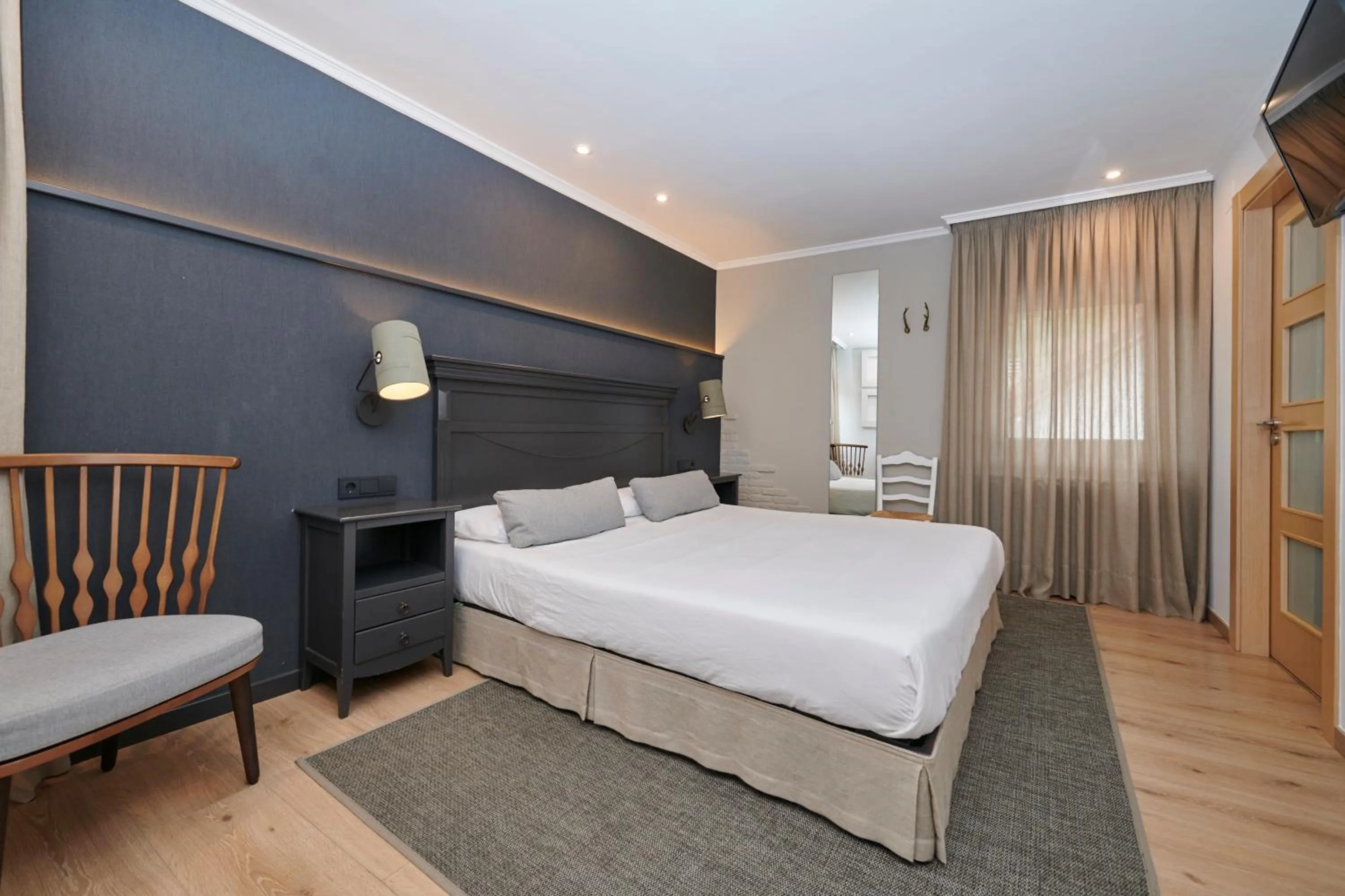 Photo of the whole room, Bed in Hostal Lola