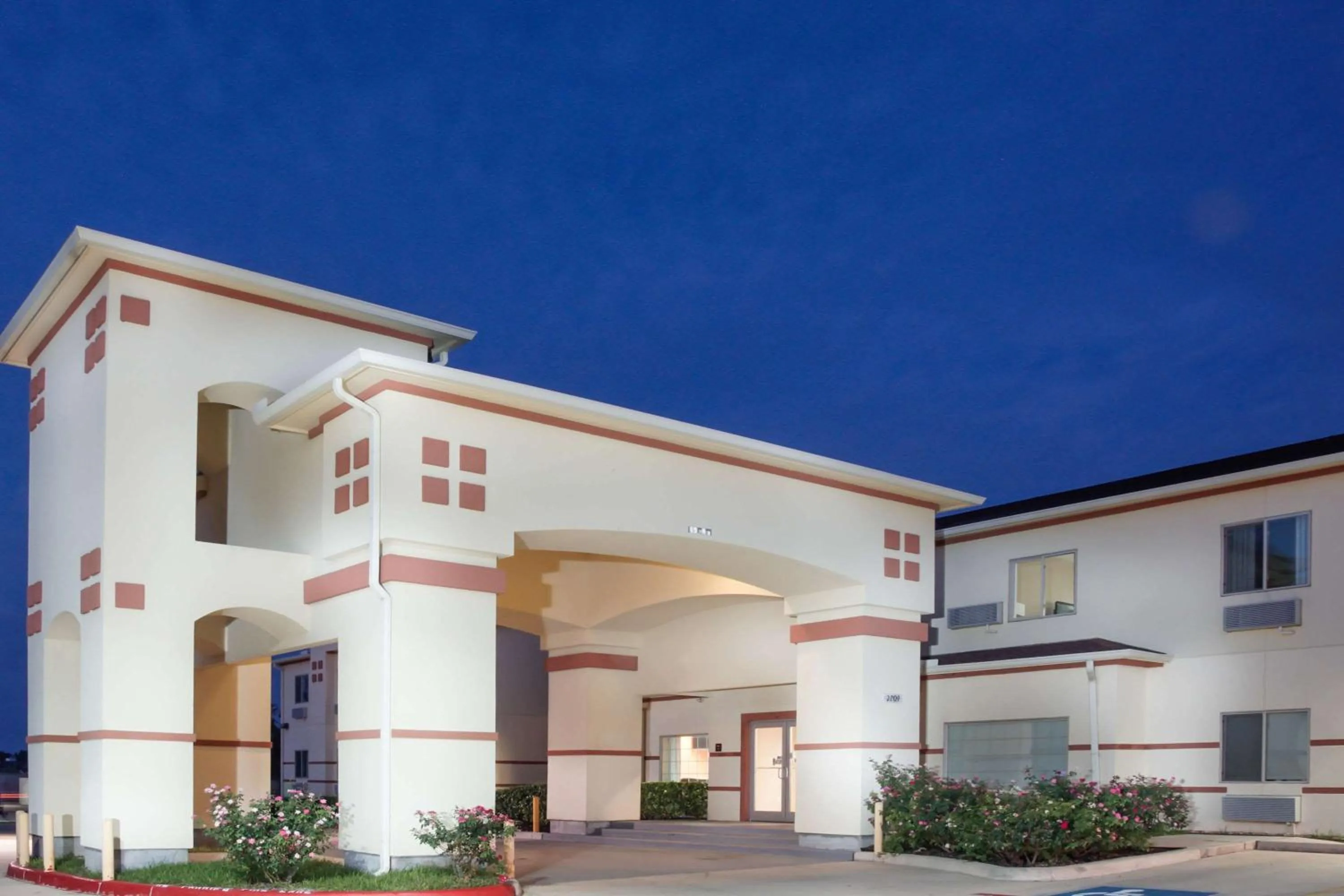 Property building in Super 8 by Wyndham Brenham TX