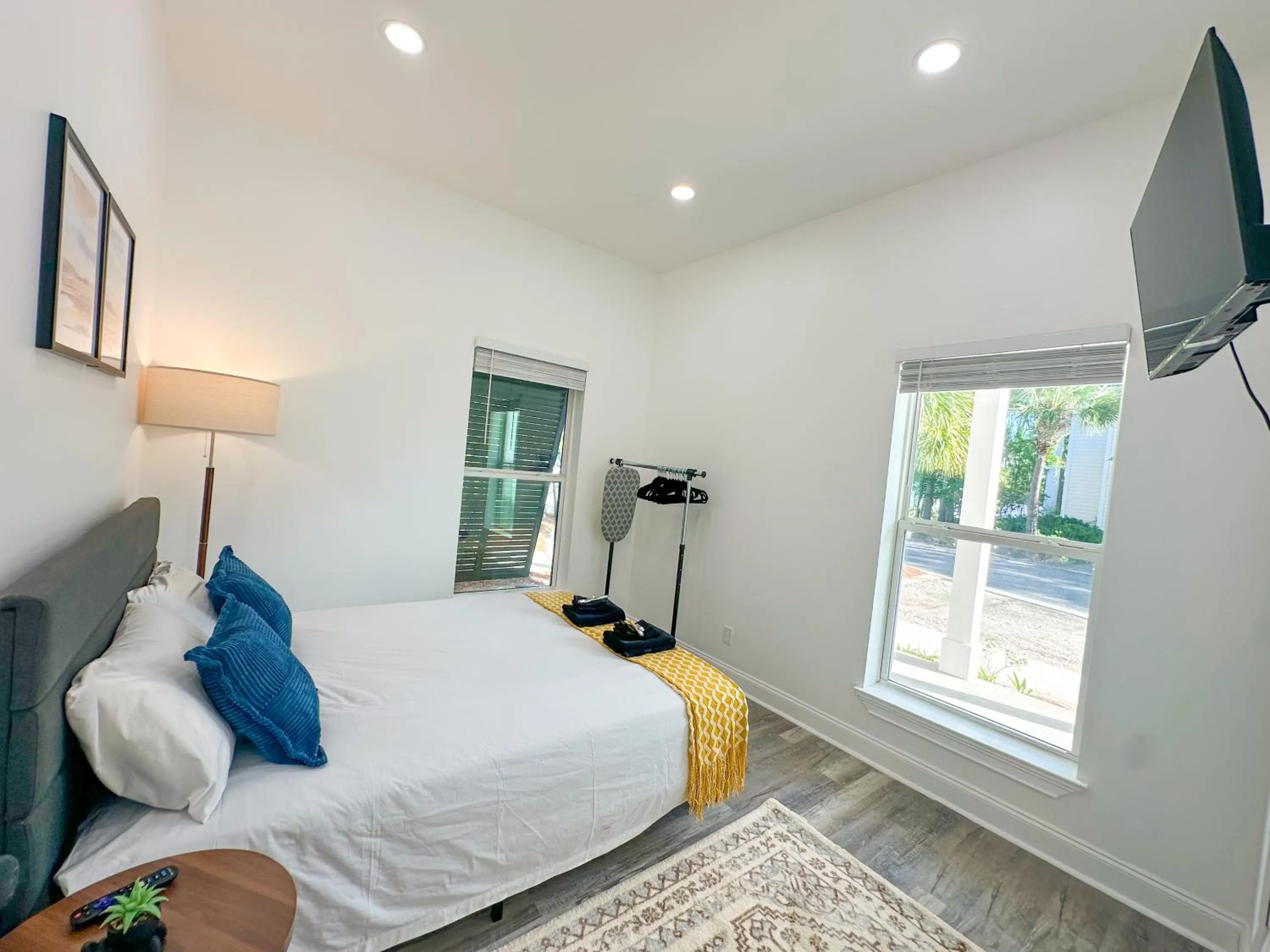 Bed in 30-A Inn & Suites