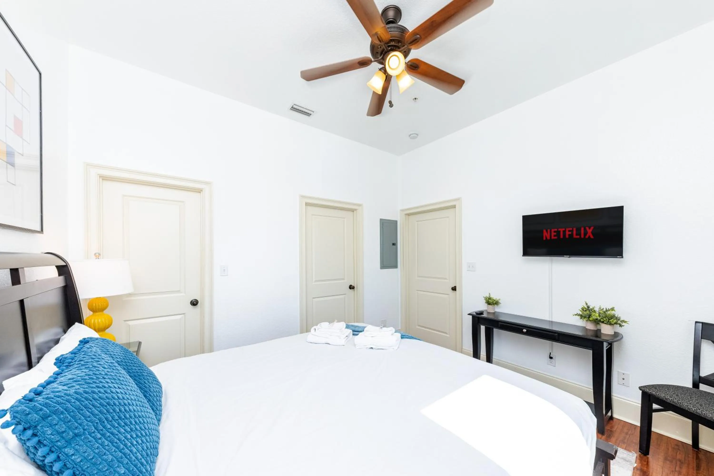 Bed in 30-A Inn & Suites