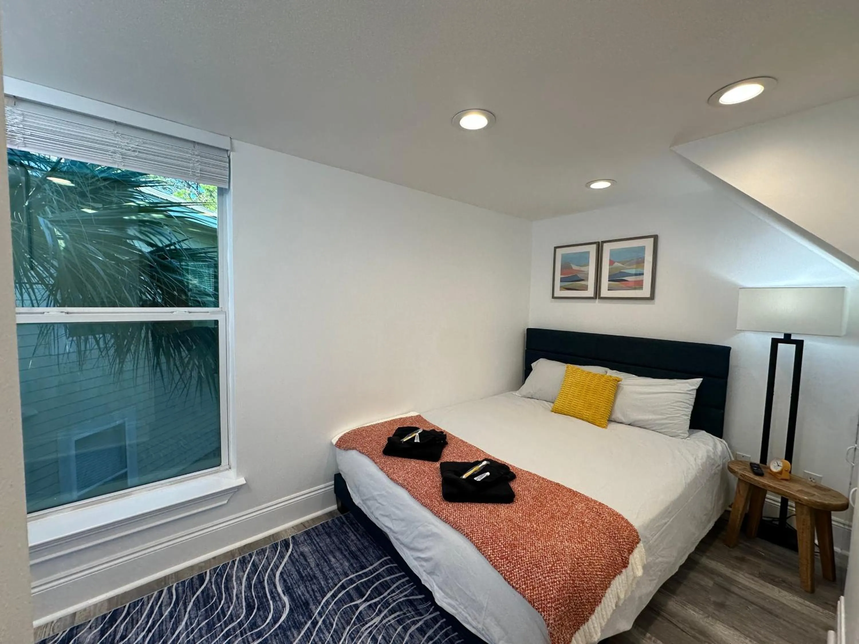 Bed in 30-A Inn & Suites