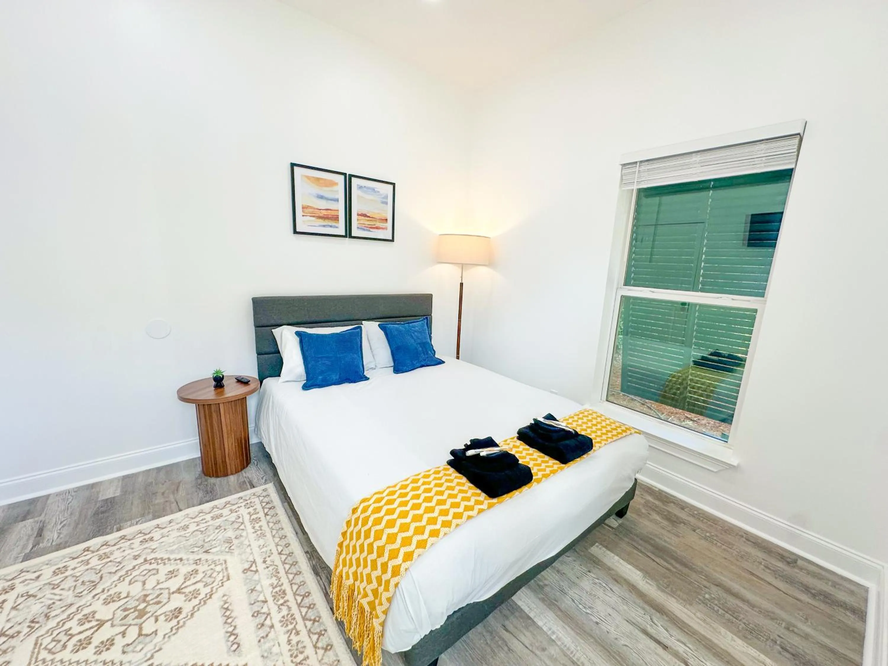 Bed in 30-A Inn & Suites