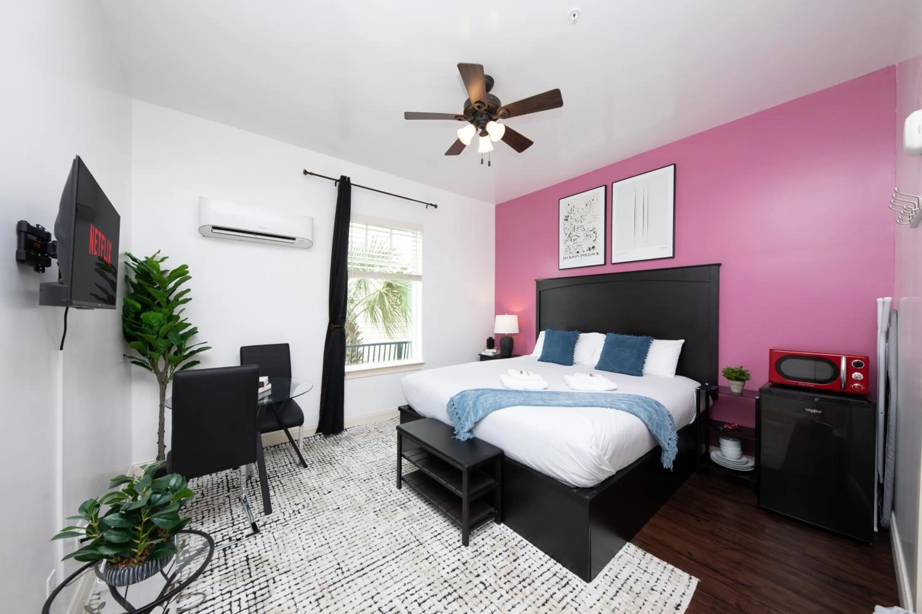 Bed in 30-A Inn & Suites