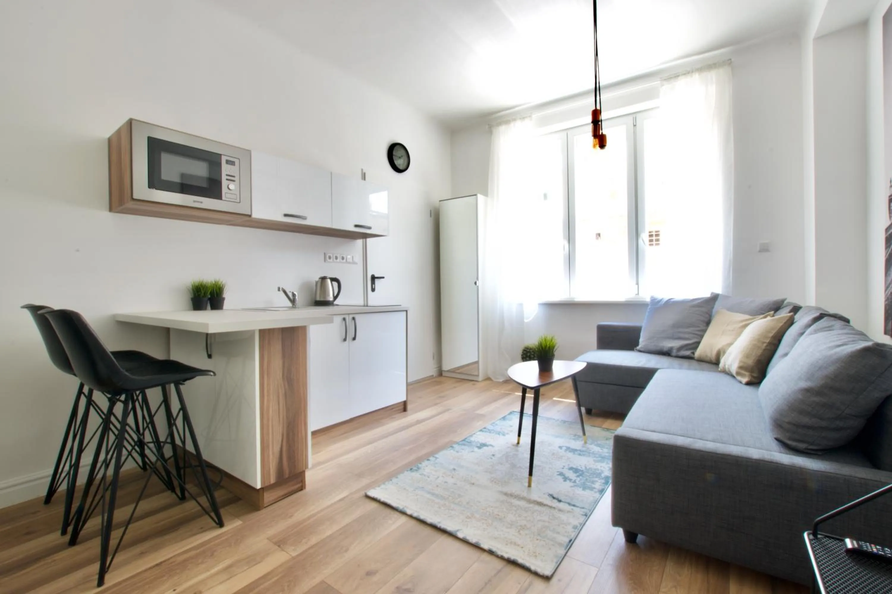 Living room in Standard Apartment by Hi5 - Régiposta