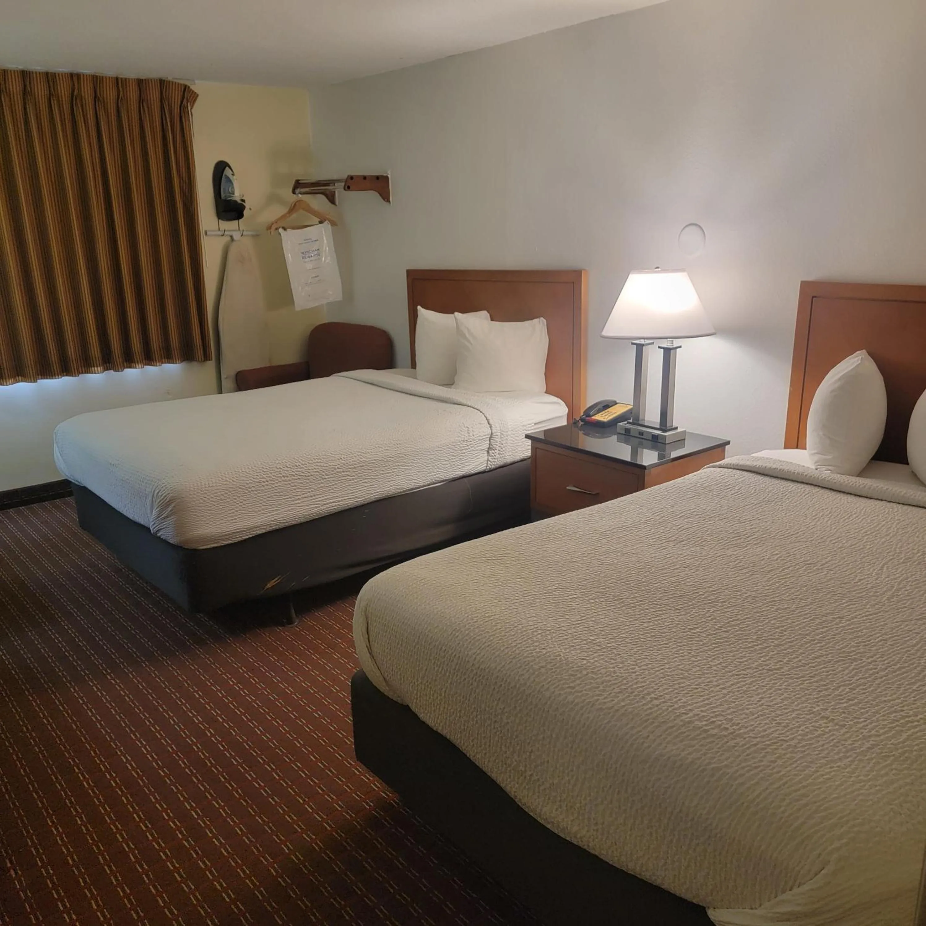 Bed in Days Inn by Wyndham Fort Dodge