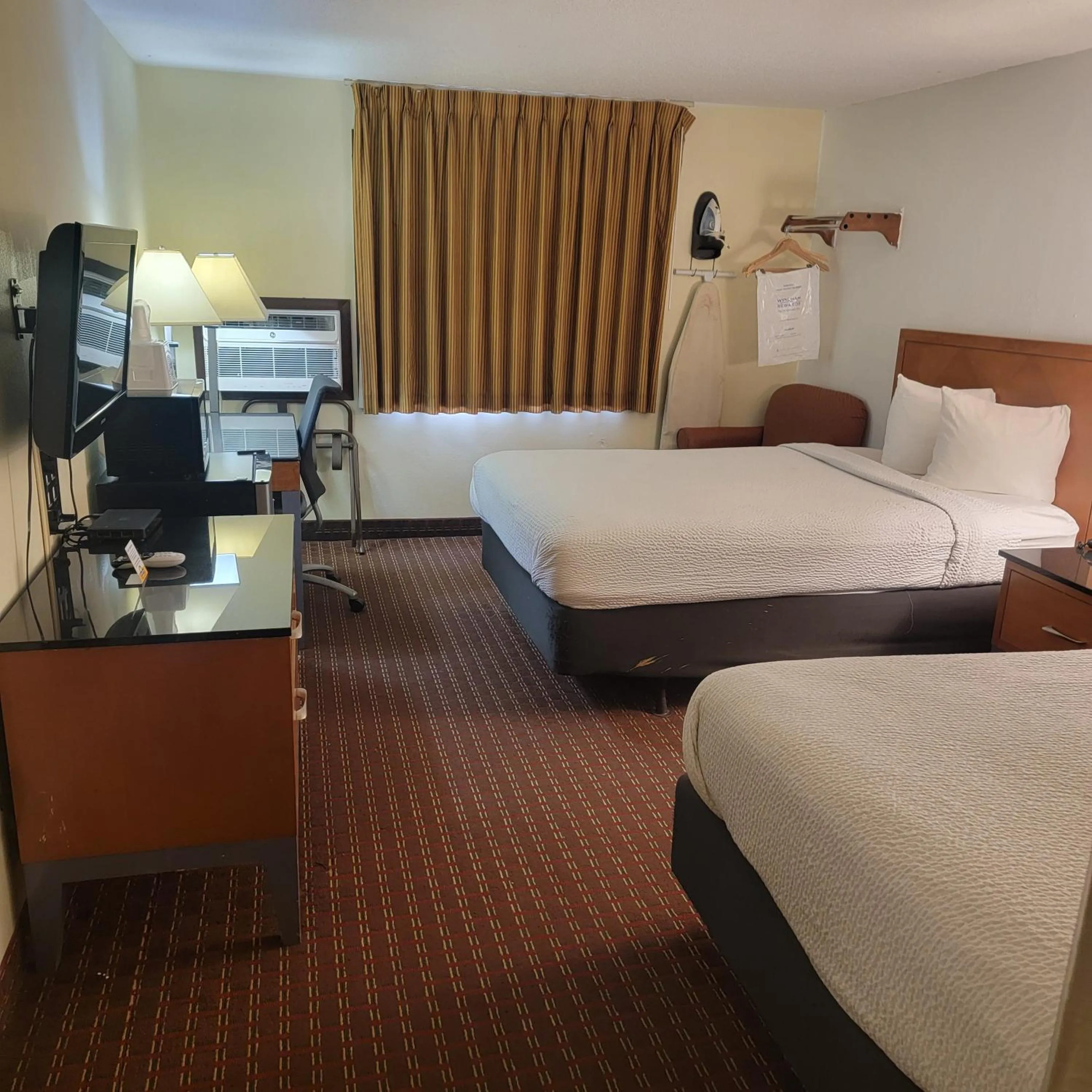 Bed in Days Inn by Wyndham Fort Dodge