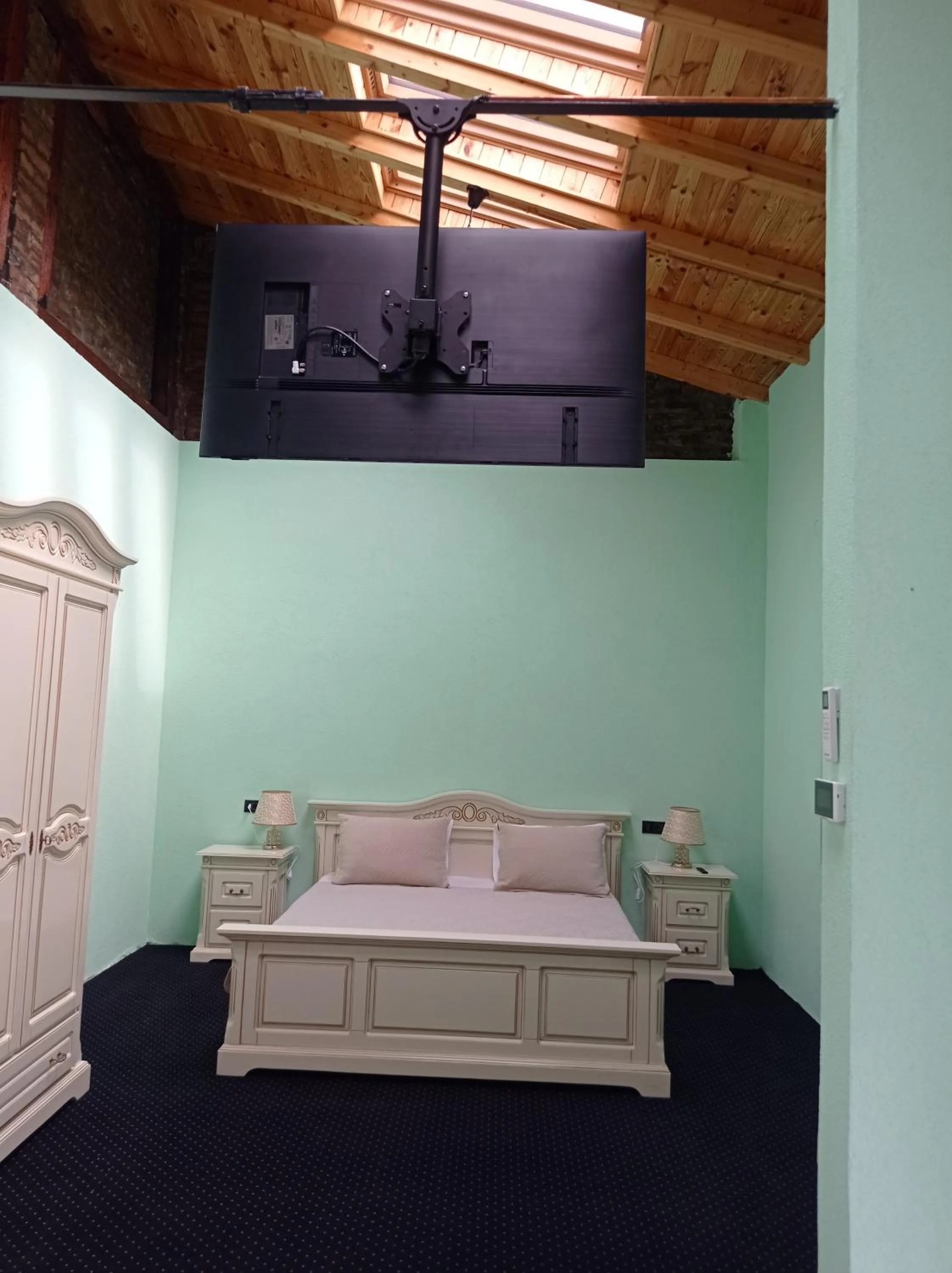 Bed in JMR Royal -Luxury Rooms & Private Sauna