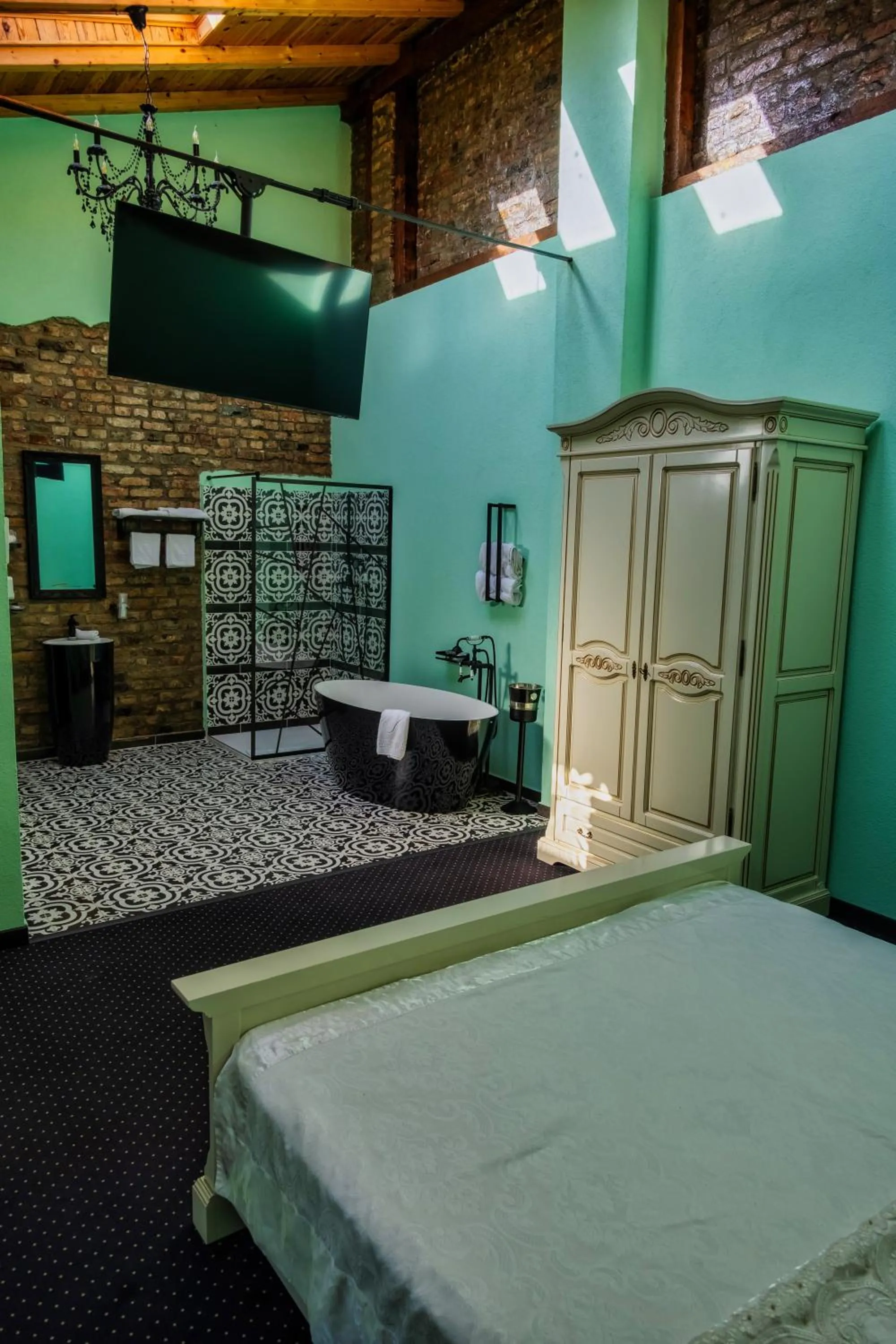 Photo of the whole room, Bed in JMR Royal -Luxury Rooms & Private Sauna