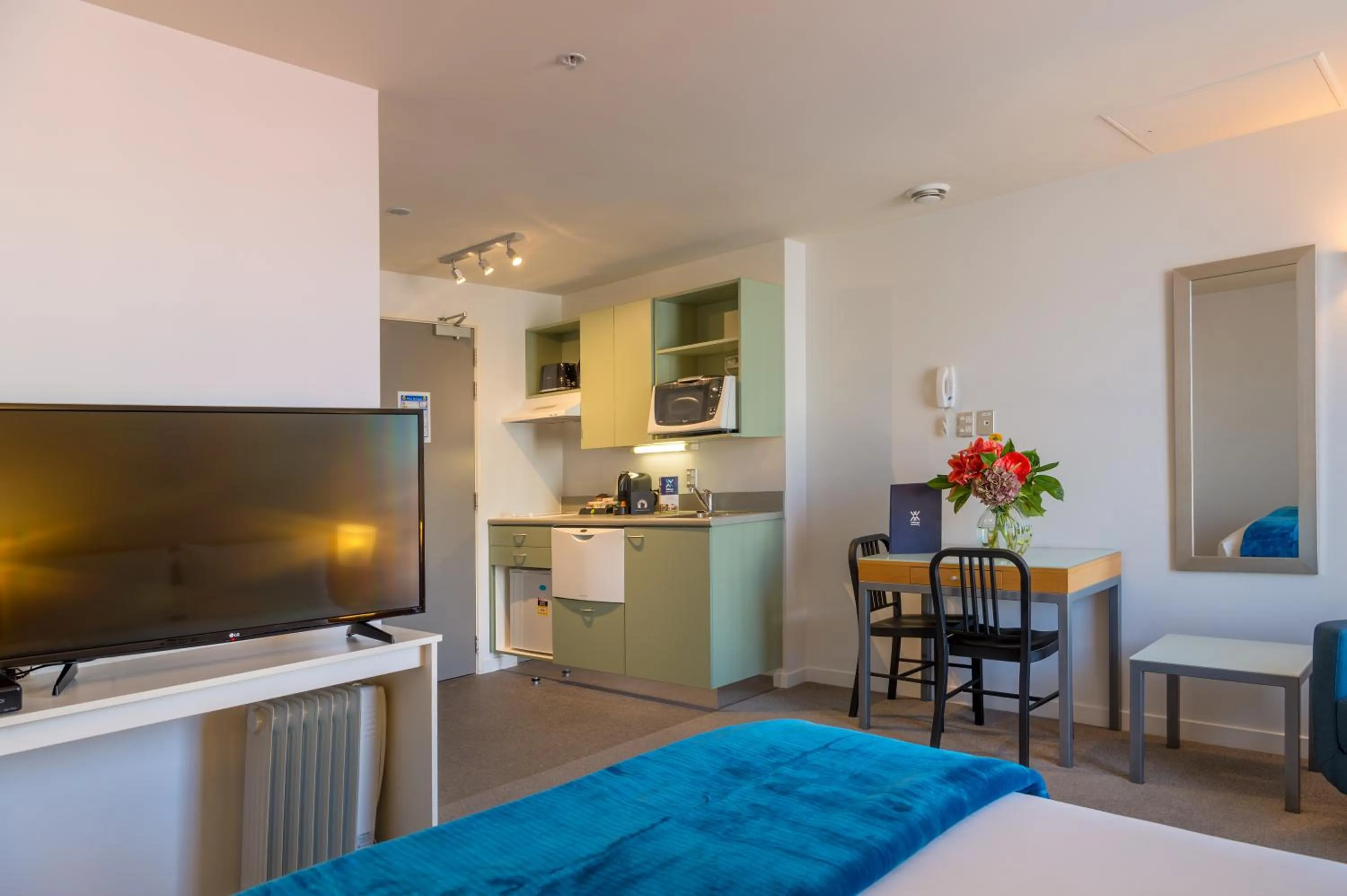 Bed in Astelia Apartment Hotel