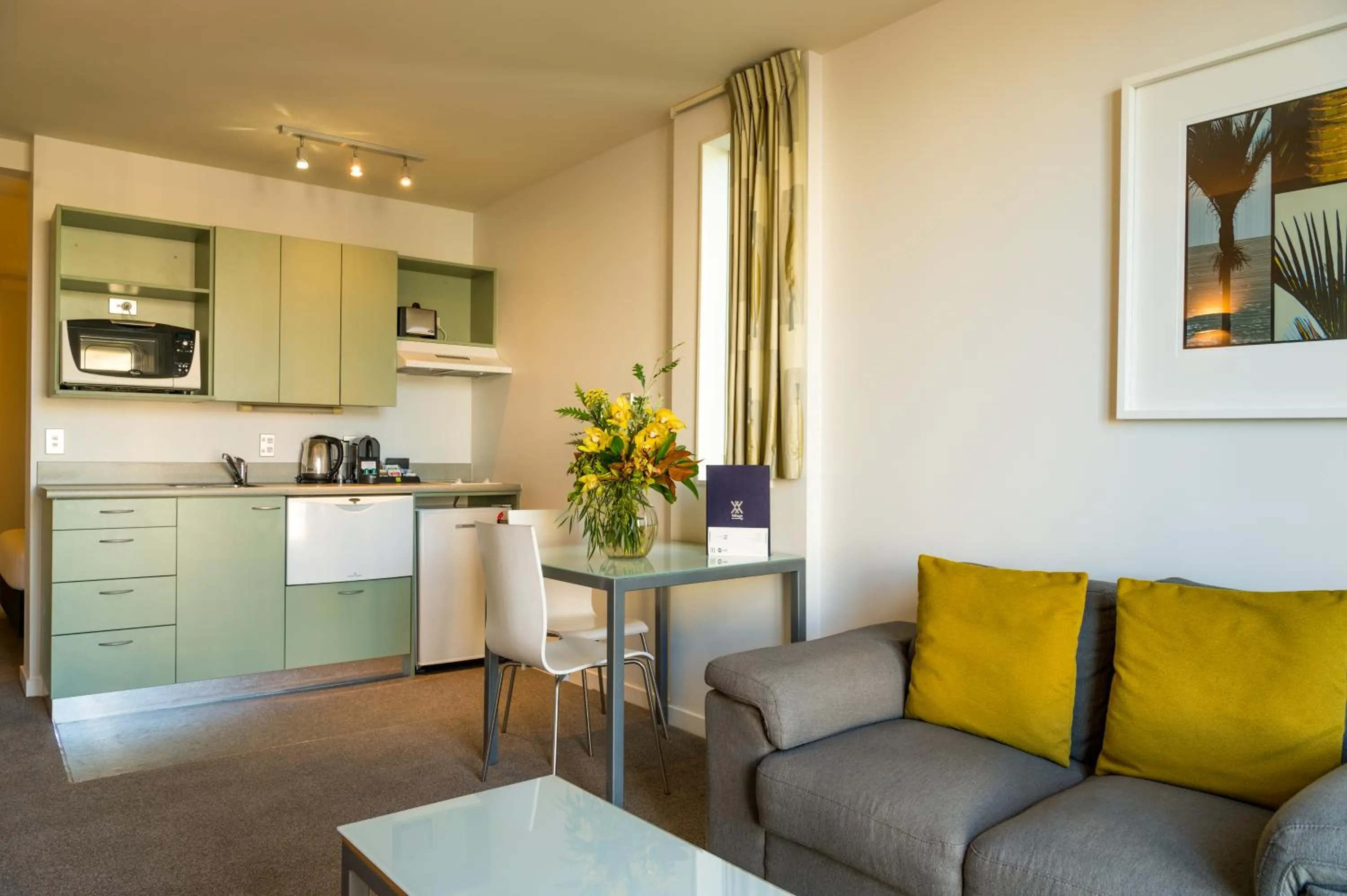 Kitchen or kitchenette in Astelia Apartment Hotel