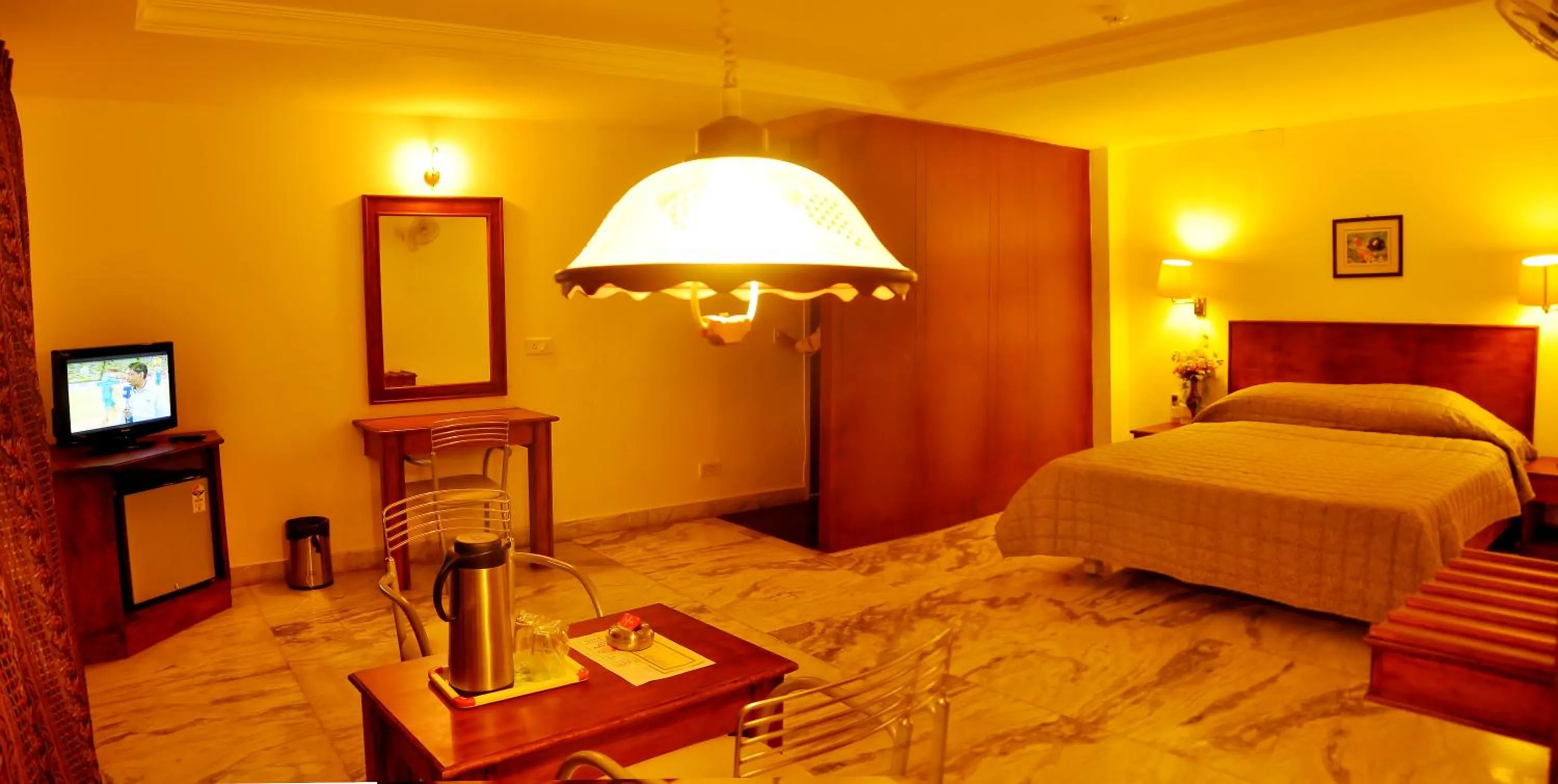 Photo of the whole room, Bed in Nayagara Hotel