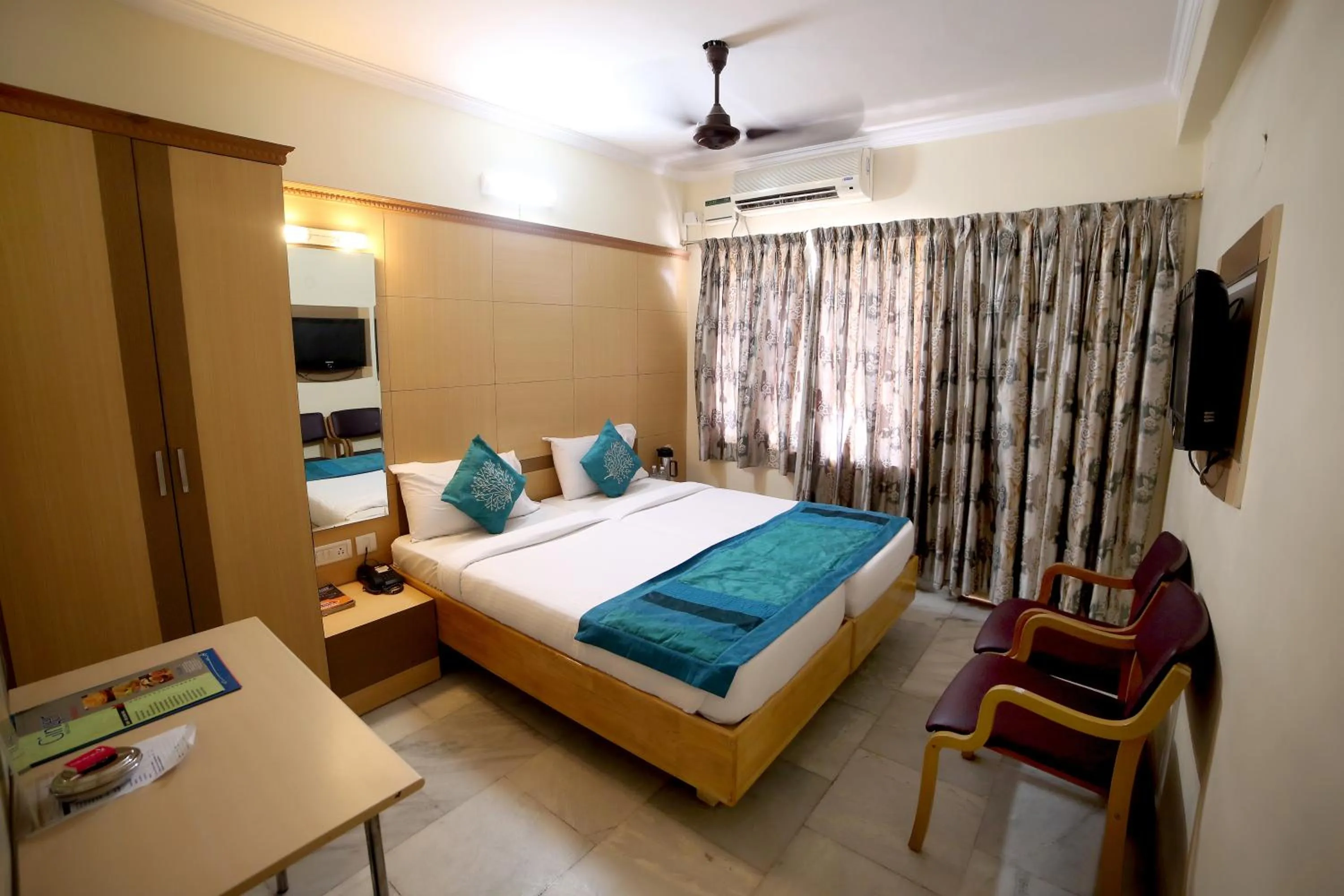 Bed in Nayagara Hotel