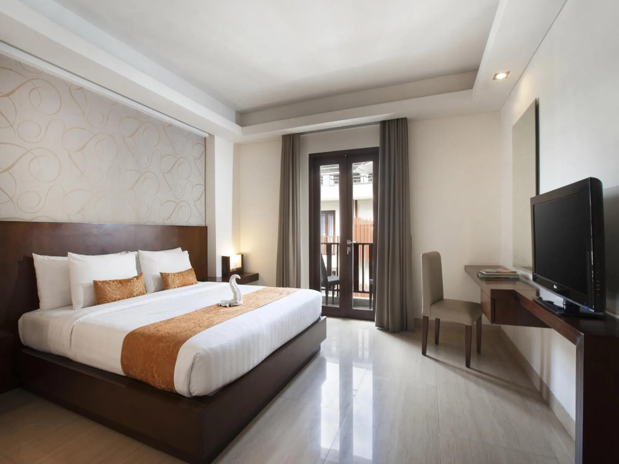 Photo of the whole room, Bed in d'primahotel Seminyak