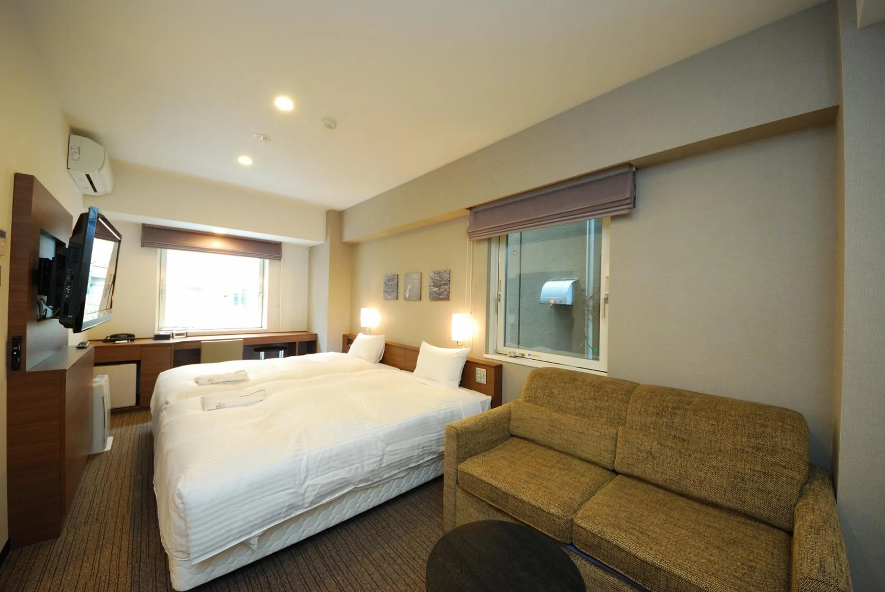 Bed in Sotetsu Fresa Inn Hamamatsucho-Daimon