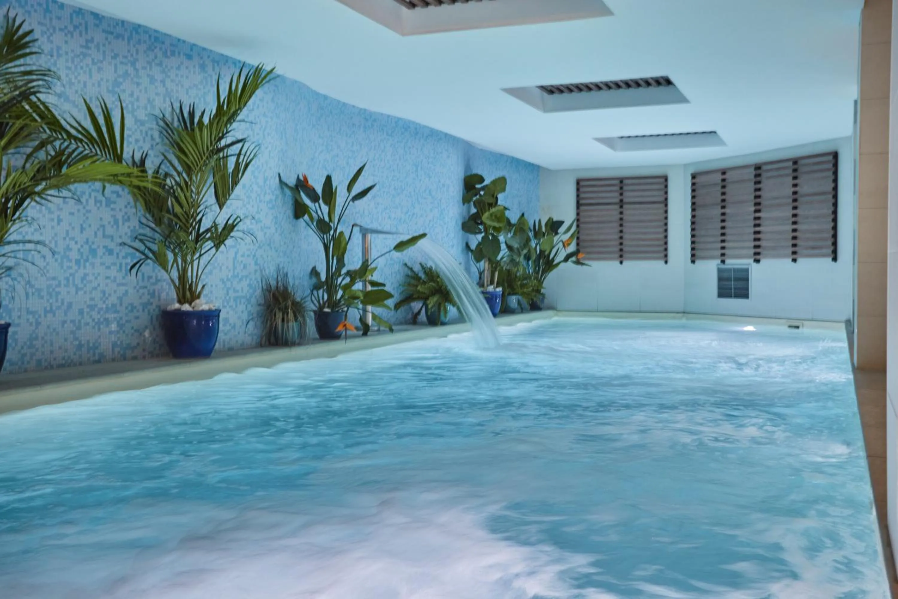 Swimming pool in Jardins de Mademoiselle Hôtel & Spa