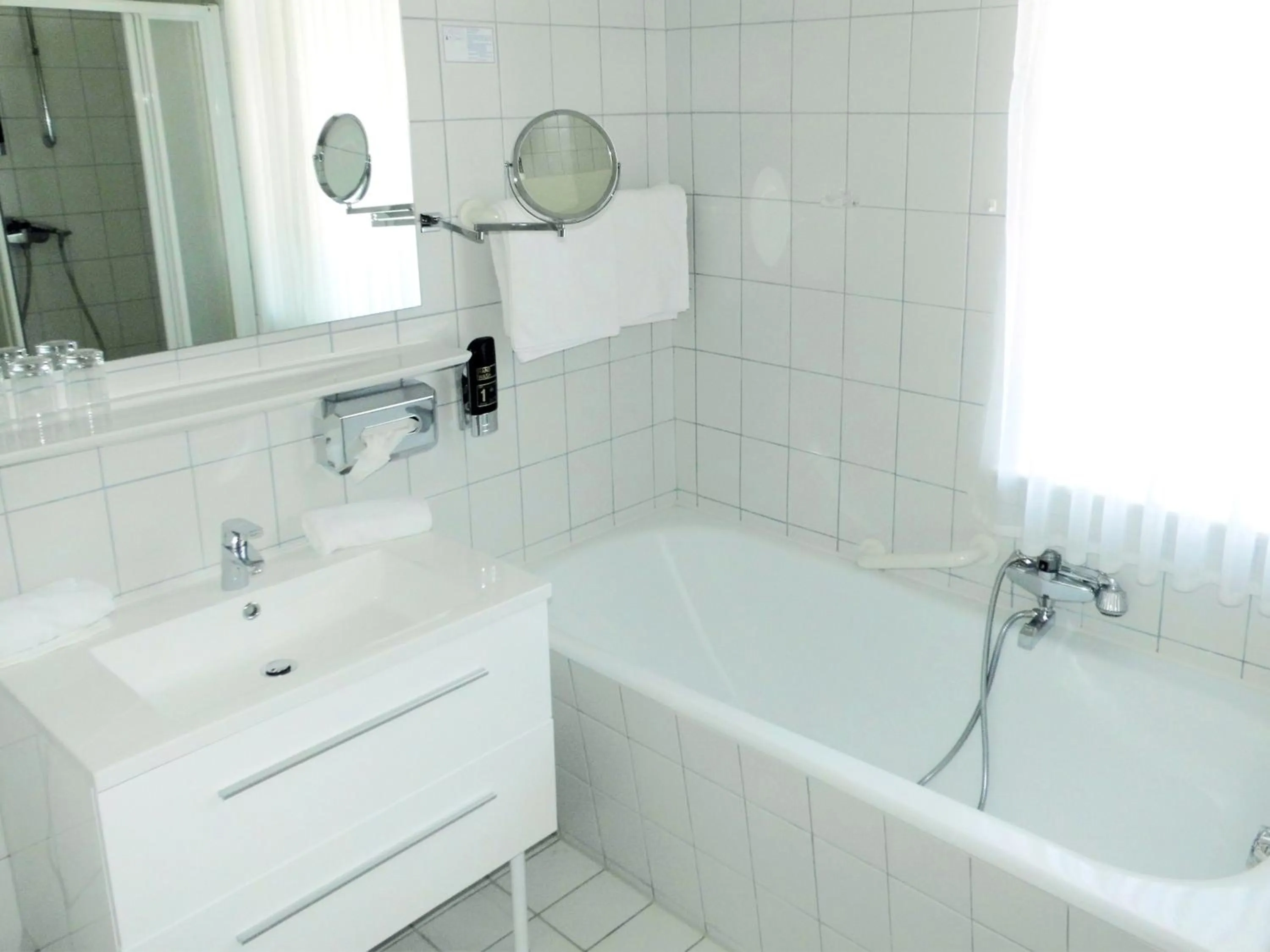 Bathroom in Hotel Pelli Hof Rendsburg by Tulip Inn