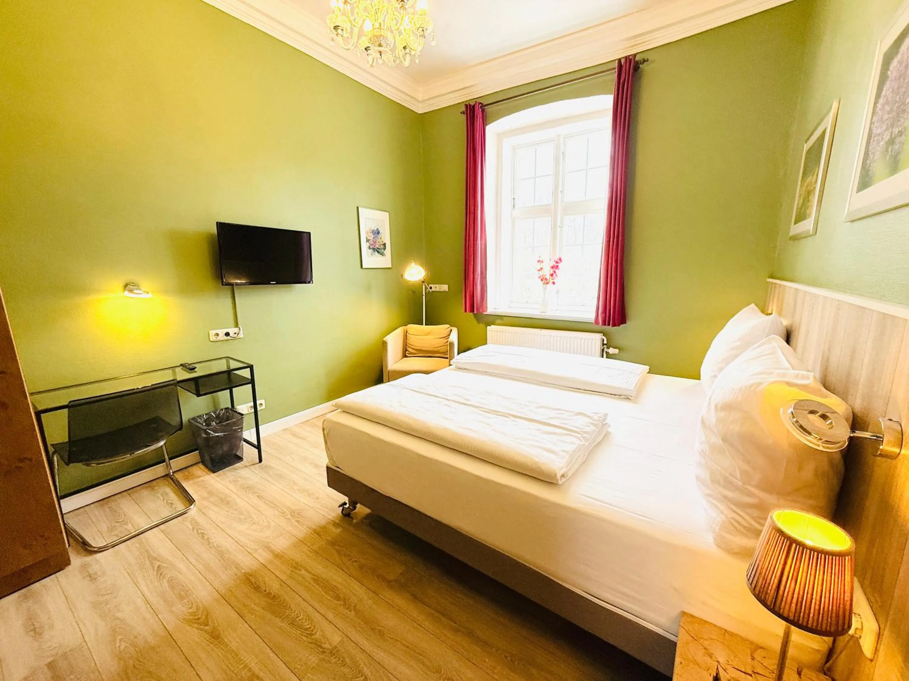 Photo of the whole room, Bed in Hotel Pelli Hof Rendsburg by Tulip Inn