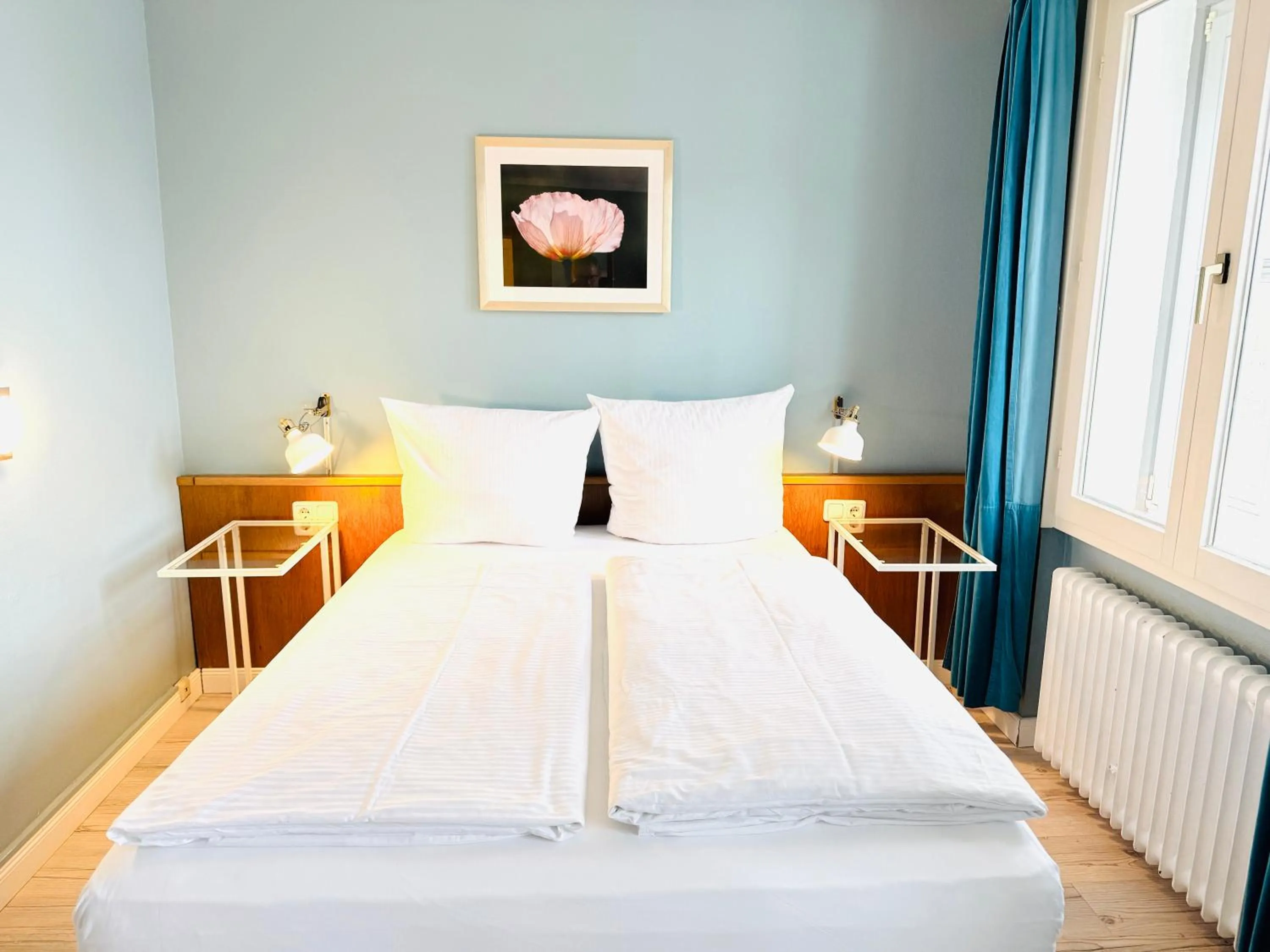 Photo of the whole room, Bed in Hotel Pelli Hof Rendsburg by Tulip Inn