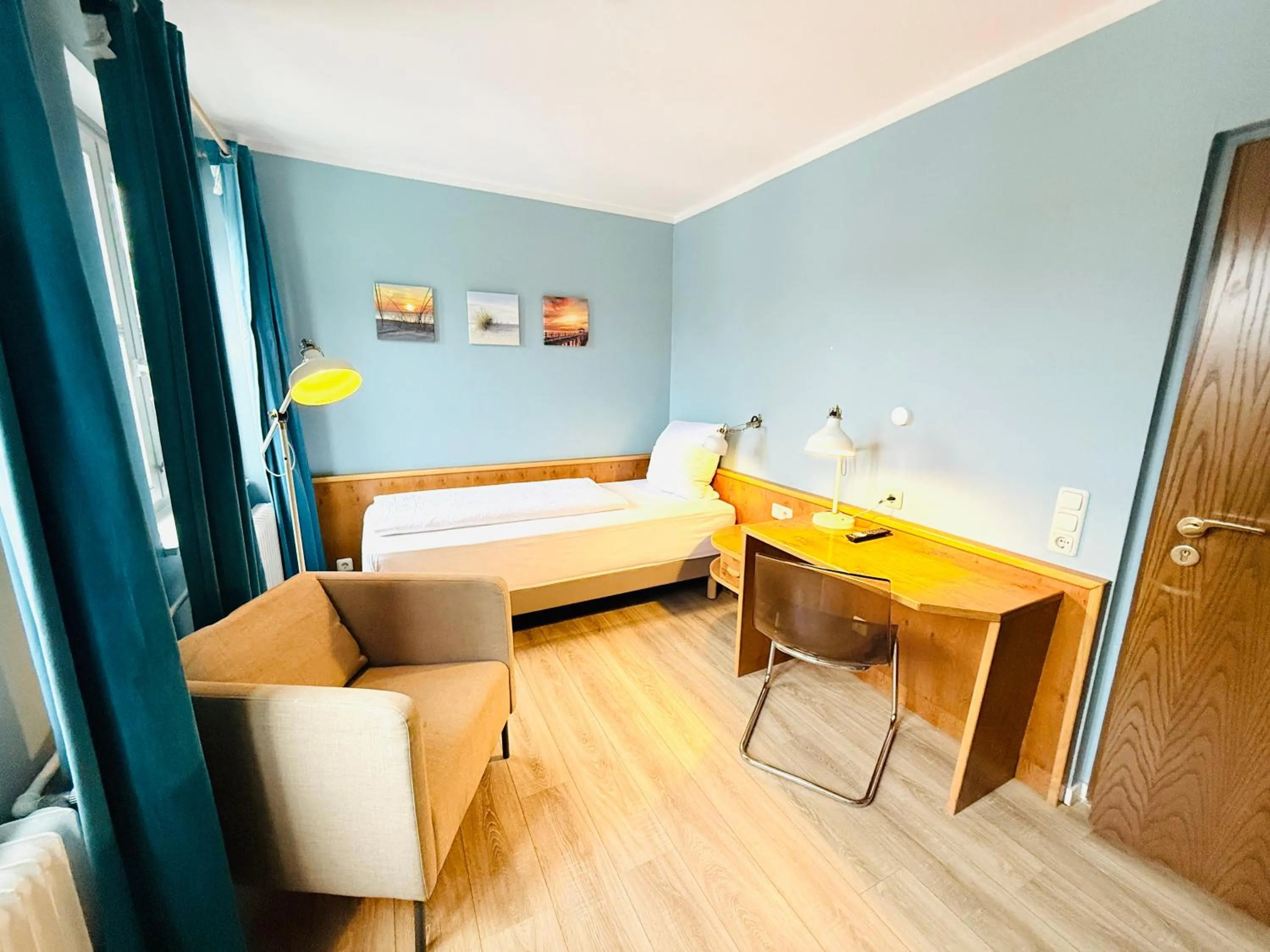 Photo of the whole room, Bed in Hotel Pelli Hof Rendsburg by Tulip Inn