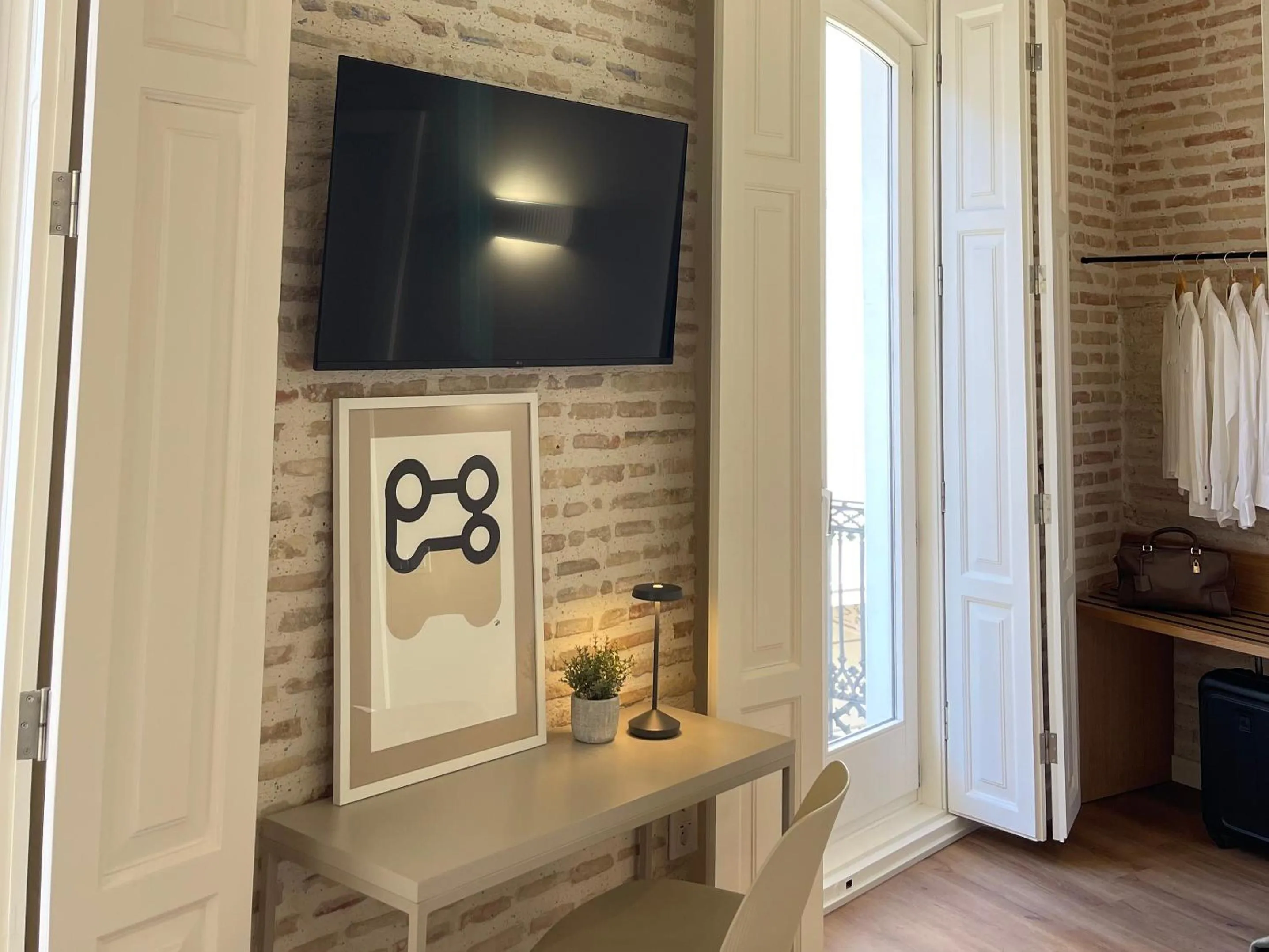 TV and multimedia in Cosy Rooms Embajador