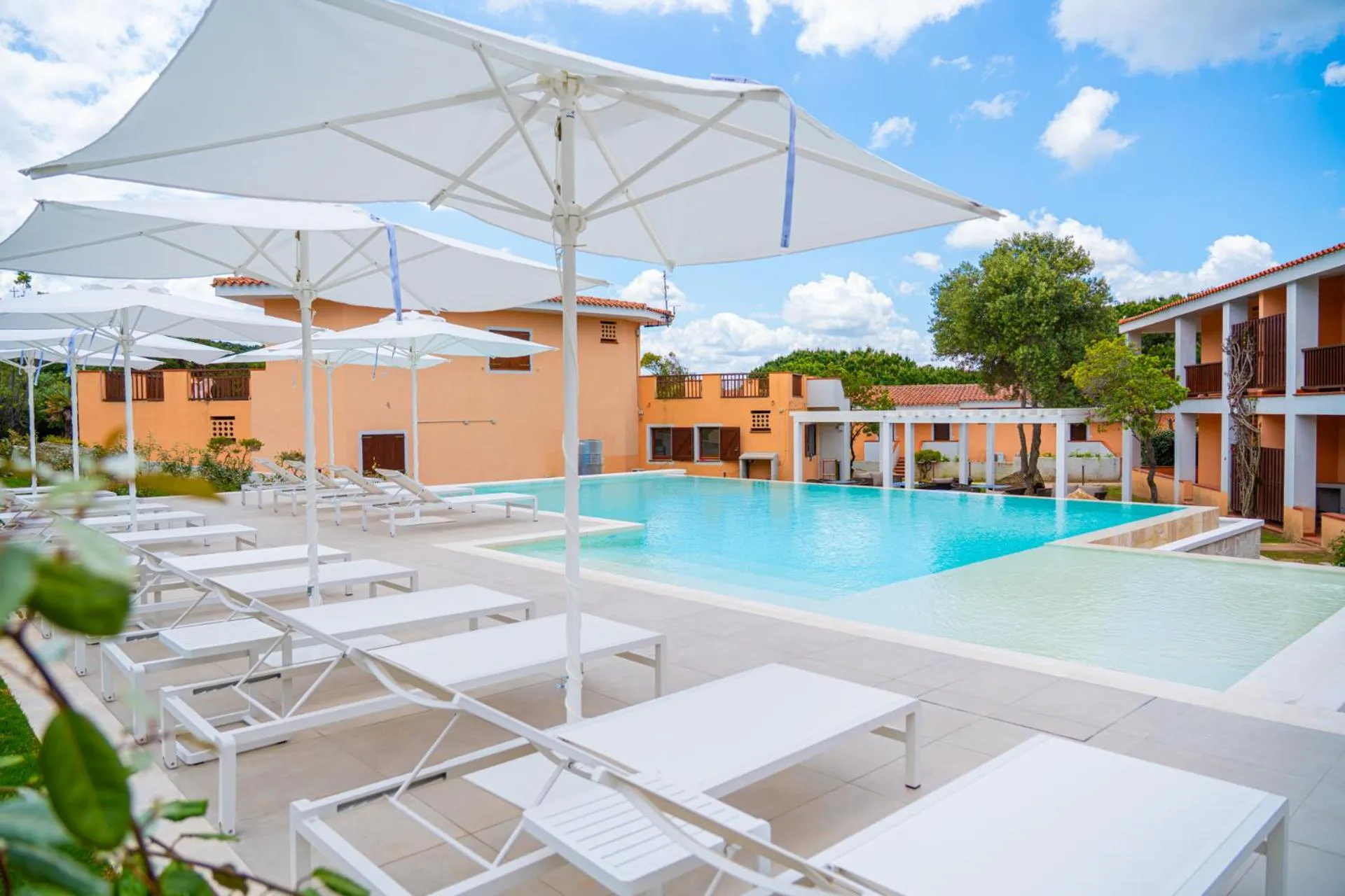 Swimming pool in Felix Hotels - Residence Hotel Costa Serena