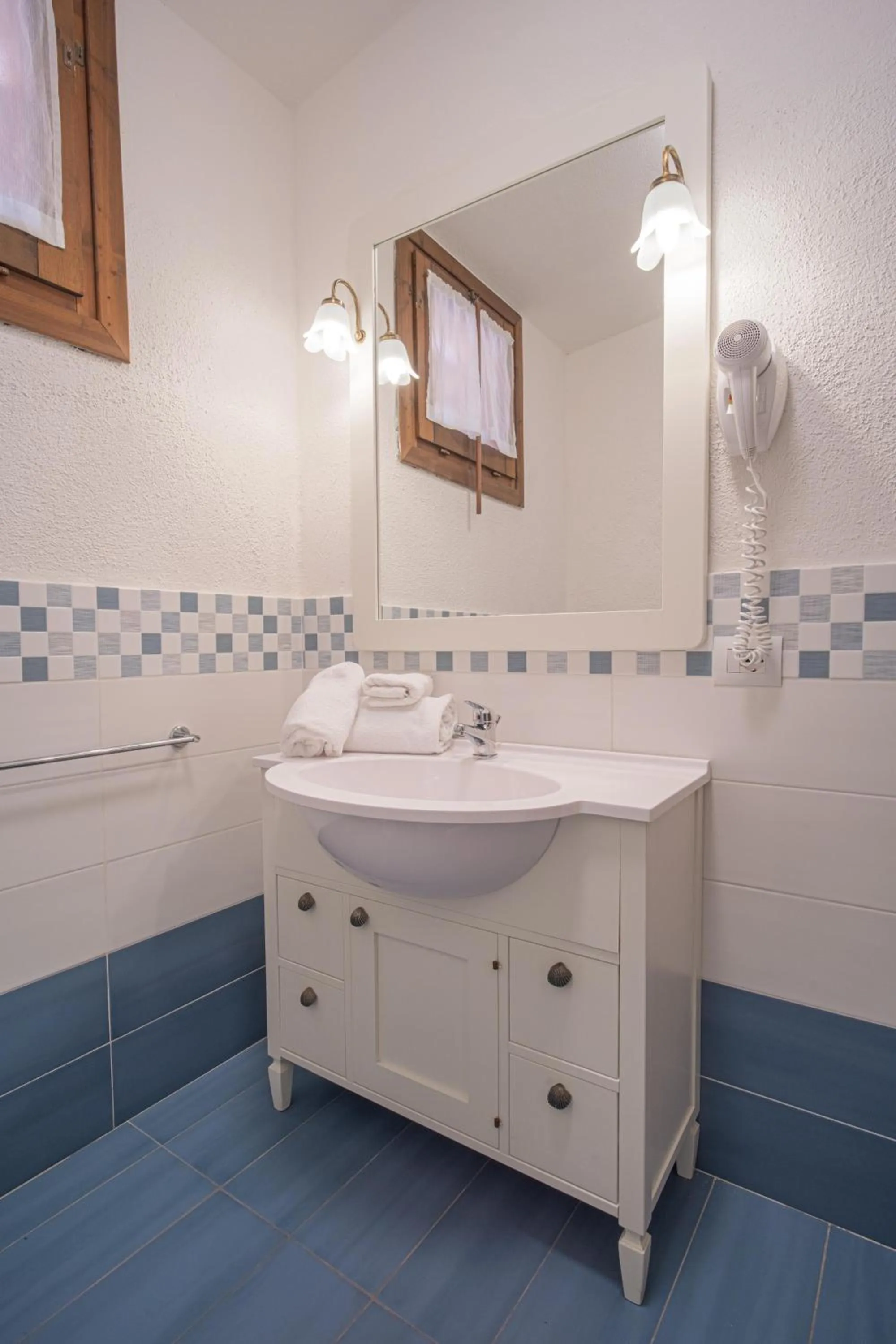 Bathroom in Felix Hotels - Residence Hotel Costa Serena