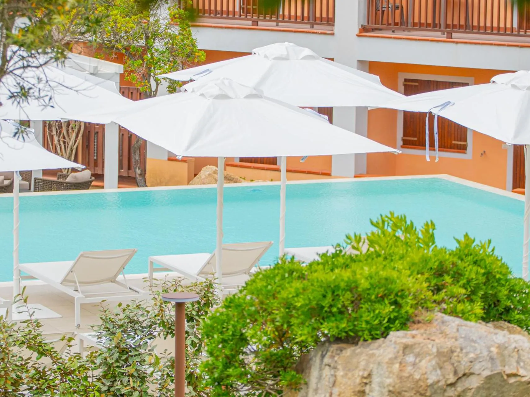 Swimming pool in Felix Hotels - Residence Hotel Costa Serena