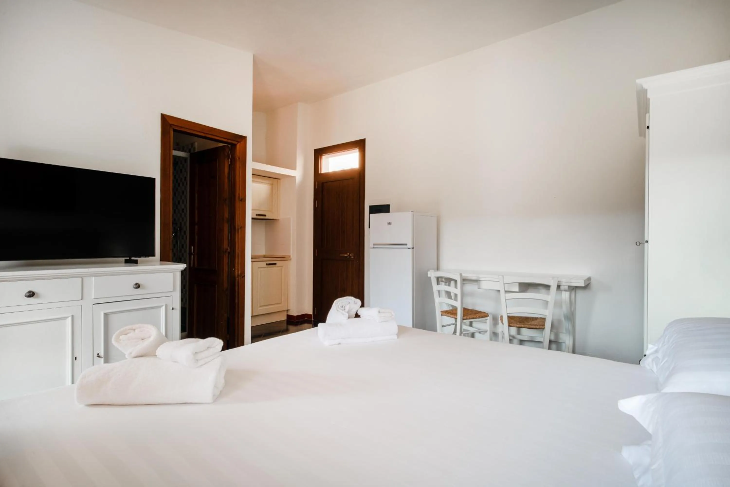 Photo of the whole room, Bed in Felix Hotels - Residence Hotel Costa Serena