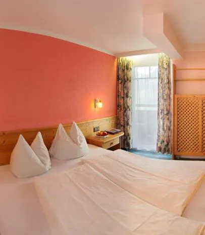 Bedroom in Hotel Hubertus