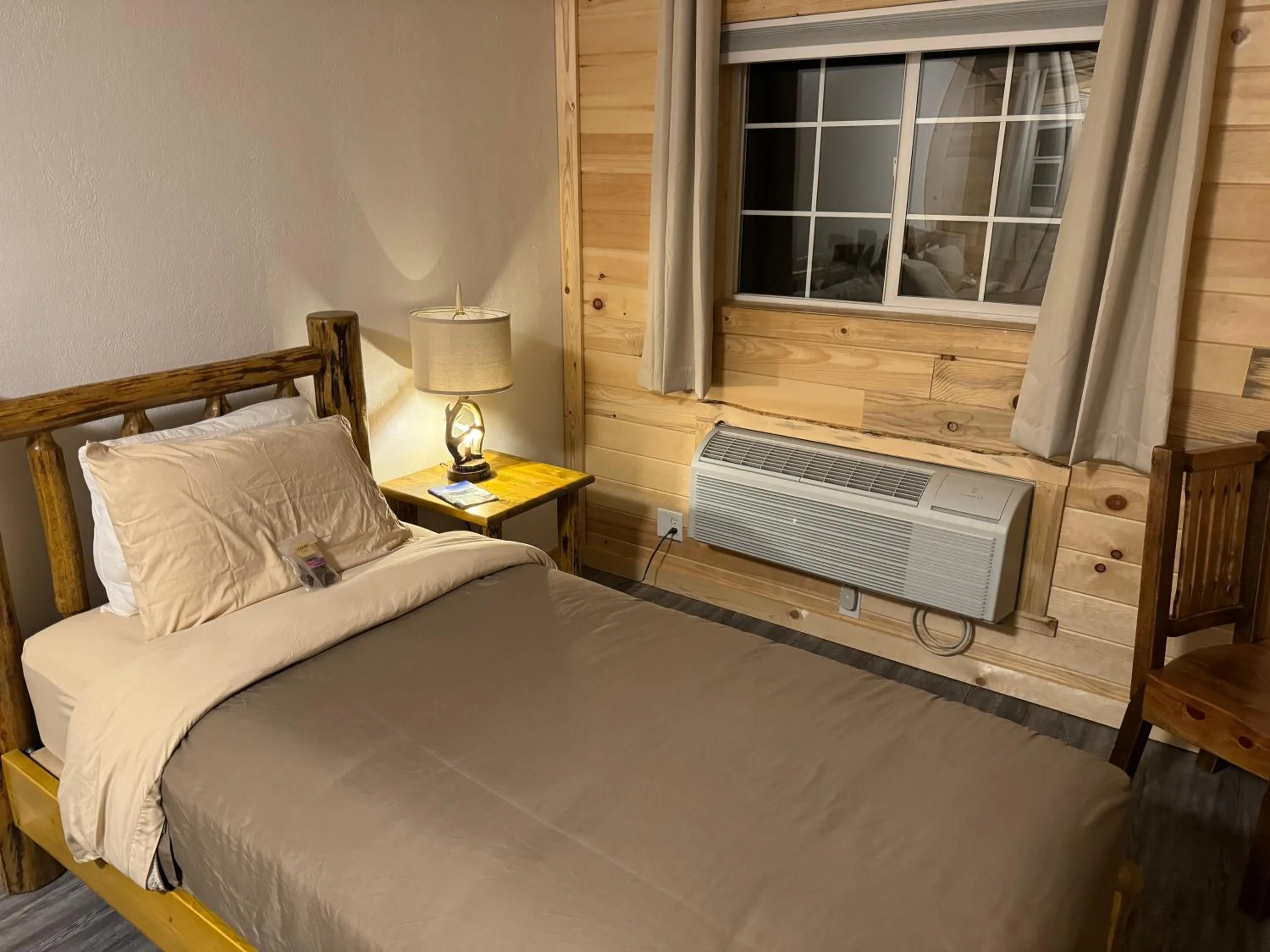 Bed in Kootenai Valley Motel